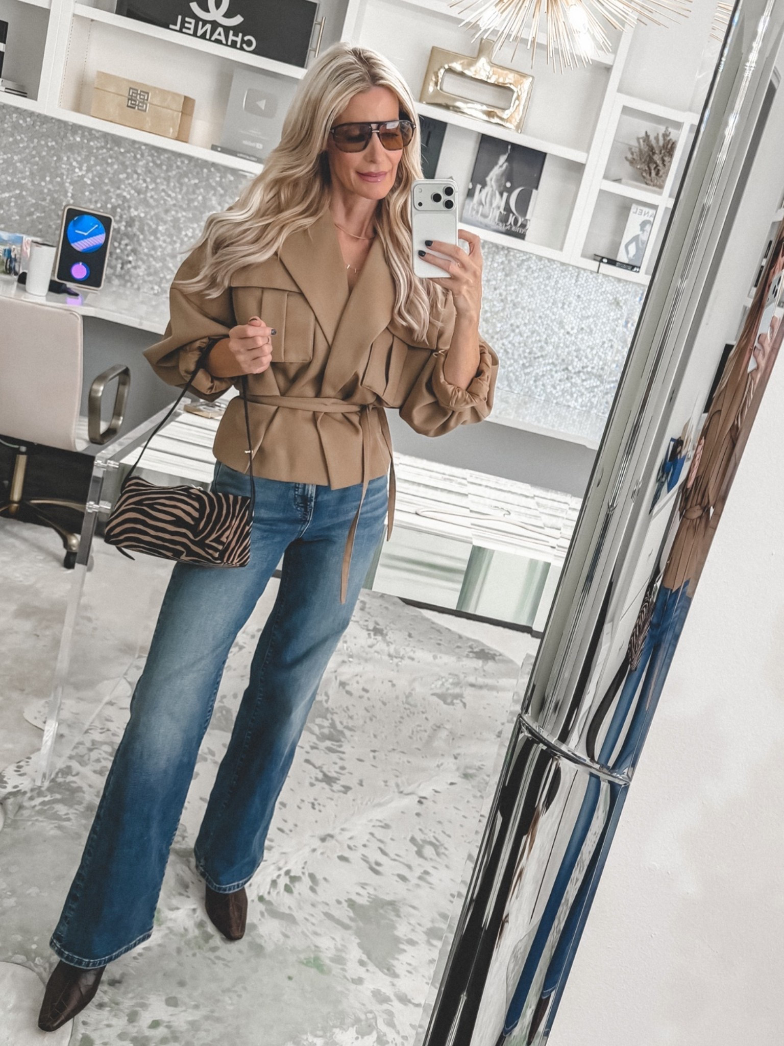An elevated fall jeans outfit made even better with these gorgeous boots on sale! I styled them with a belted camel jacket and classic jeans, then added a zebra-print bag for a chic mix of fall textures. I’m wearing an XS in the jacket and a size 24 in the jeans. #LTKStyleTip

#LTKSaleAlert#LTKOver40 

 