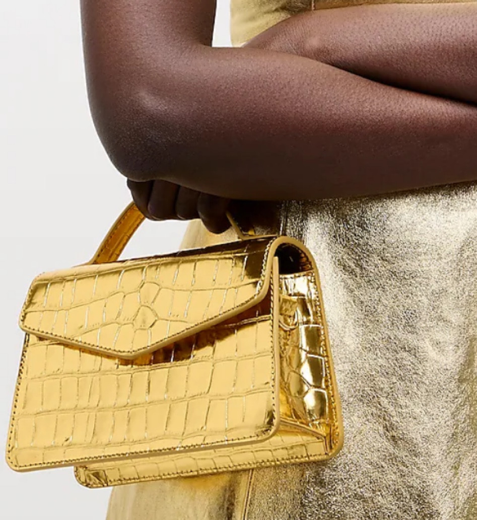 How perfect is this gold crocodile handbag?! I’ll be carrying this on New Year’s Eve! Bachelorette party look. Vegas purse  

#LTKitbag #LTKstyletip #LTKparties