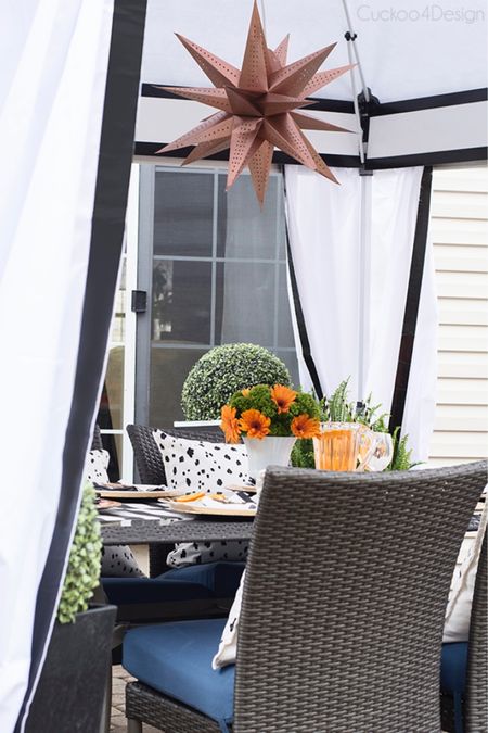 Outdoor dining in style with black and white accents #patio #homedecor #outdoordining #outdoorliving Wayfair outdoor sale

#LTKSeasonal #LTKhome #LTKsalealert