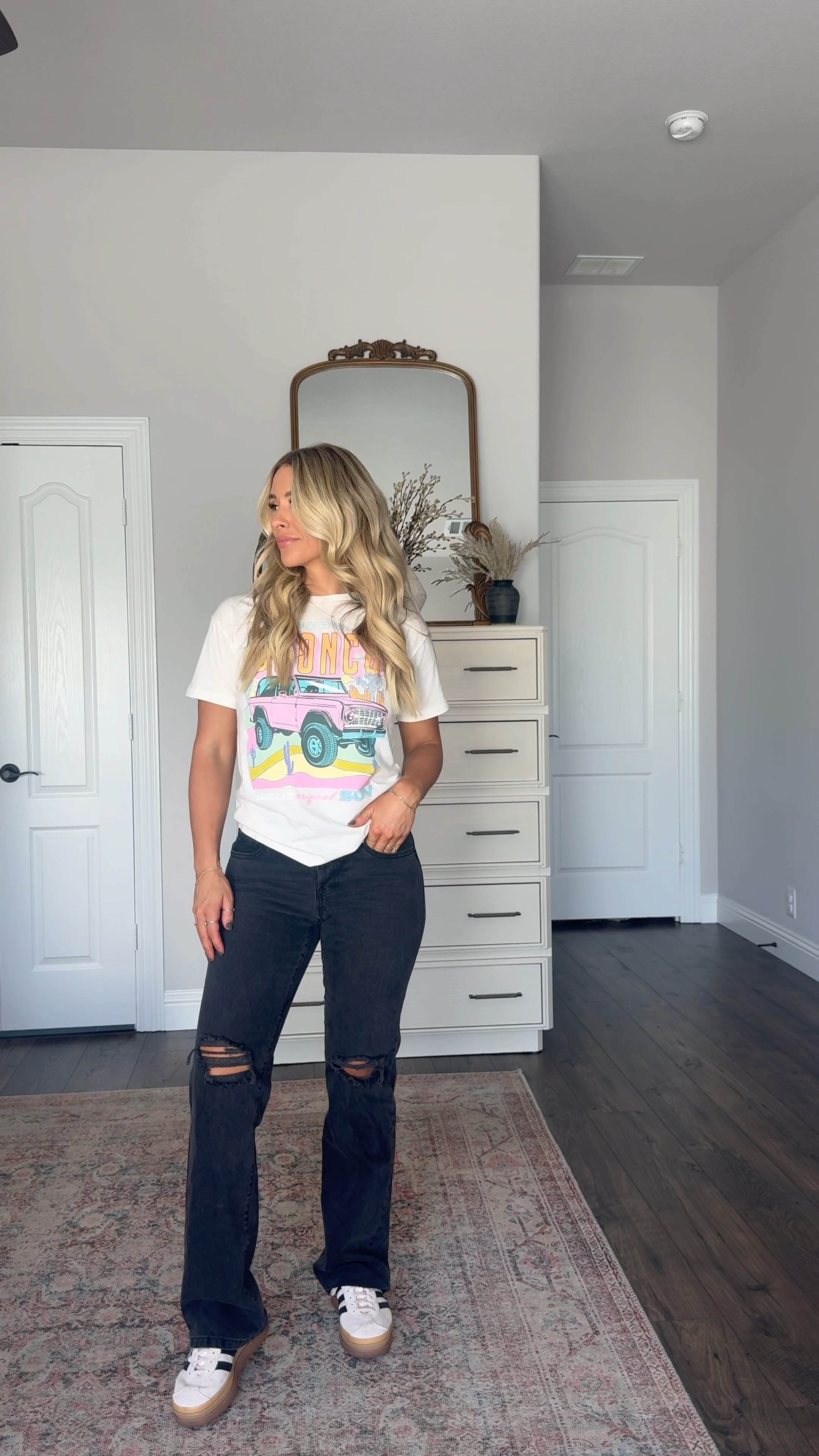 Size 4 in the jeans 
Medium bronco shirt
Small in the leopard vest 
Medium in the lace tank 