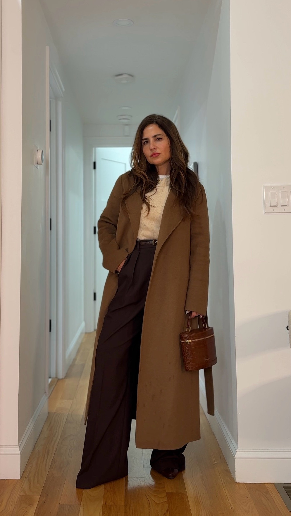 Your go-to formula when you want to look polished fast! ☺️✨
I start with:
• white tee
• chocolate tailored trousers
• belt (always cinch the waist)
• soft knit layer
• statement gold
• structured coat
• rich brown bag

The formula is simple.
Neutrals + structure + texture + gold.

Everything here is linked in my LTK.
If you’ve been saying “I have nothing to wear”… start here.

Save this as your elevated everyday uniform.
Date night outfit, work wear, office outfit, winter outfi, polished outfitts

#LTKSaleAlert #LTKPetite #LTKootd