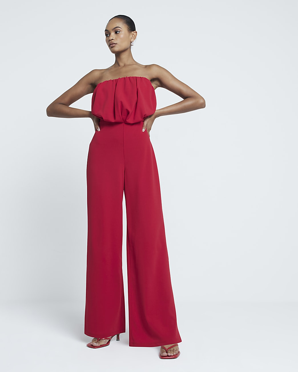 Red Bandeau Bubble Hem Jumpsuit | River Island (UK & IE)