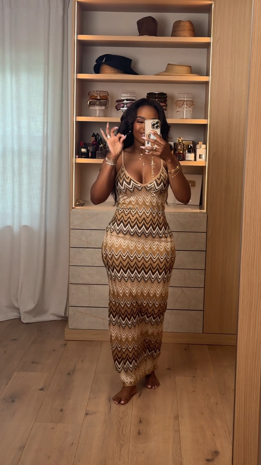 Hi Babes! 🤎✨

This knit maxi is giving effortless vacation luxury! The flattering body-hugging fit, neutral zig-zag print, and lightweight knit make it the perfect throw-on-and-go summer dress.

✨ Fit Details:
• Wearing a Size Small
• True to size
• Stretchy knit fabric
• Figure-flattering silhouette
• Lightweight and comfortable

🤍 Where to Wear:
• Beach vacations
• Resort dinners
• Sunset cocktails
• Brunch
• Cruise nights
• Summer date nights

✨ Style Tip:
Pair it with gold jewelry, oversized sunnies, and a woven bag for the ultimate luxe vacation look, or dress it up with strappy heels for dinner.

Everything is linked below!

xx, Kira | IG: KirasFashionFinds

Measurements:
5'4" | Size Small | 140 lbs