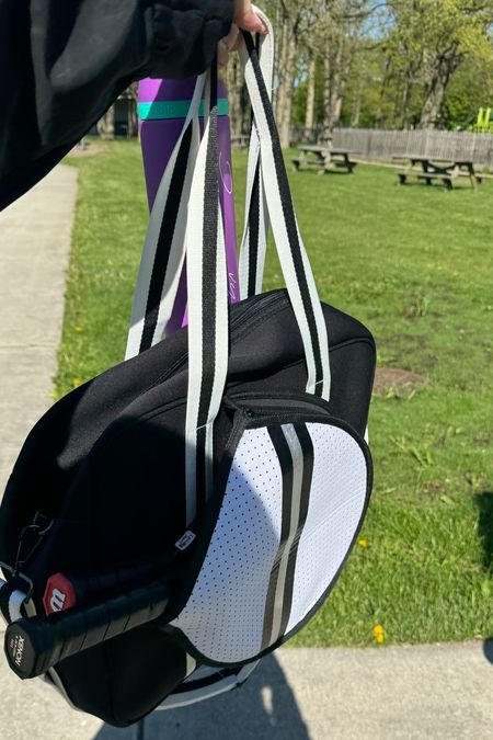 The best racquetball bag!!! I can fit 3 paddles in the designated area (tennis, pickle ball, and paddle ball) and I love the neoprene fabric! Plus, it's cute! Can be worn on your shoulder or as a cross body bag! 

#LTKFitness #LTKActive #LTKMidsize