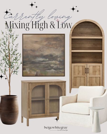 Mixing high and low home decor and furniture! Check out the price on this beautiful arched cabinet! This olive tree is on major sale too!! 

#LTKSaleAlert #LTKHome #LTKStyleTip