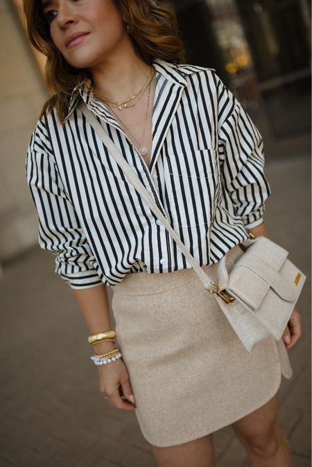 The prettiest stripe button down shirt! Currently available via H&M but it’s selling fast! Highly encourage you to get it! It’s so chic and looks amazing with anything. 
Top size xs
Skirt is sold out. Linked similar ones.
Spring outfit, stripe button down, mini skirt, Jacquemus bag

#LTKSeasonal #LTKfindsunder100 #LTKfindsunder50