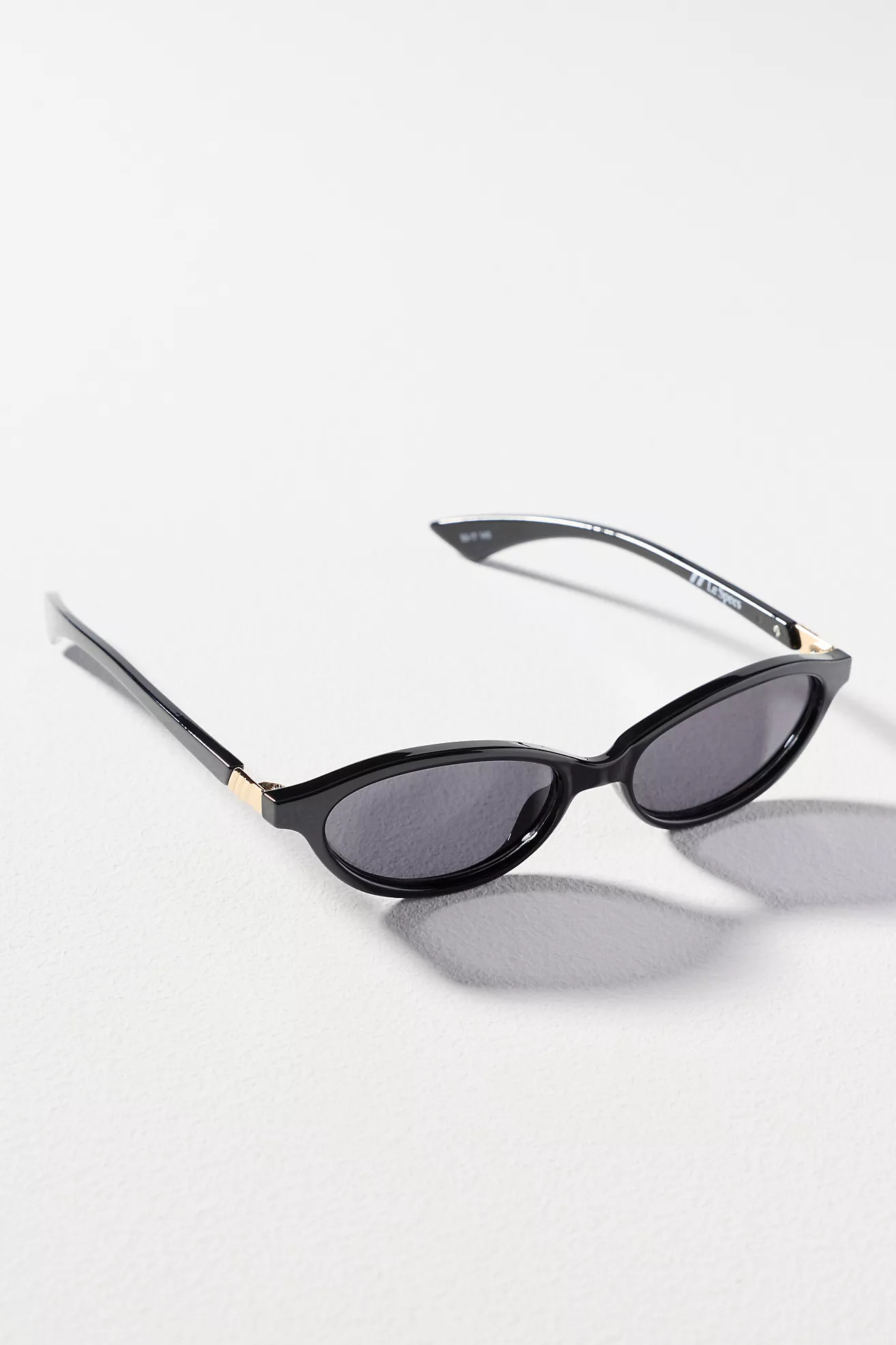 Le Specs Duskfall Small Oval Sunglasses | Anthropologie (US)