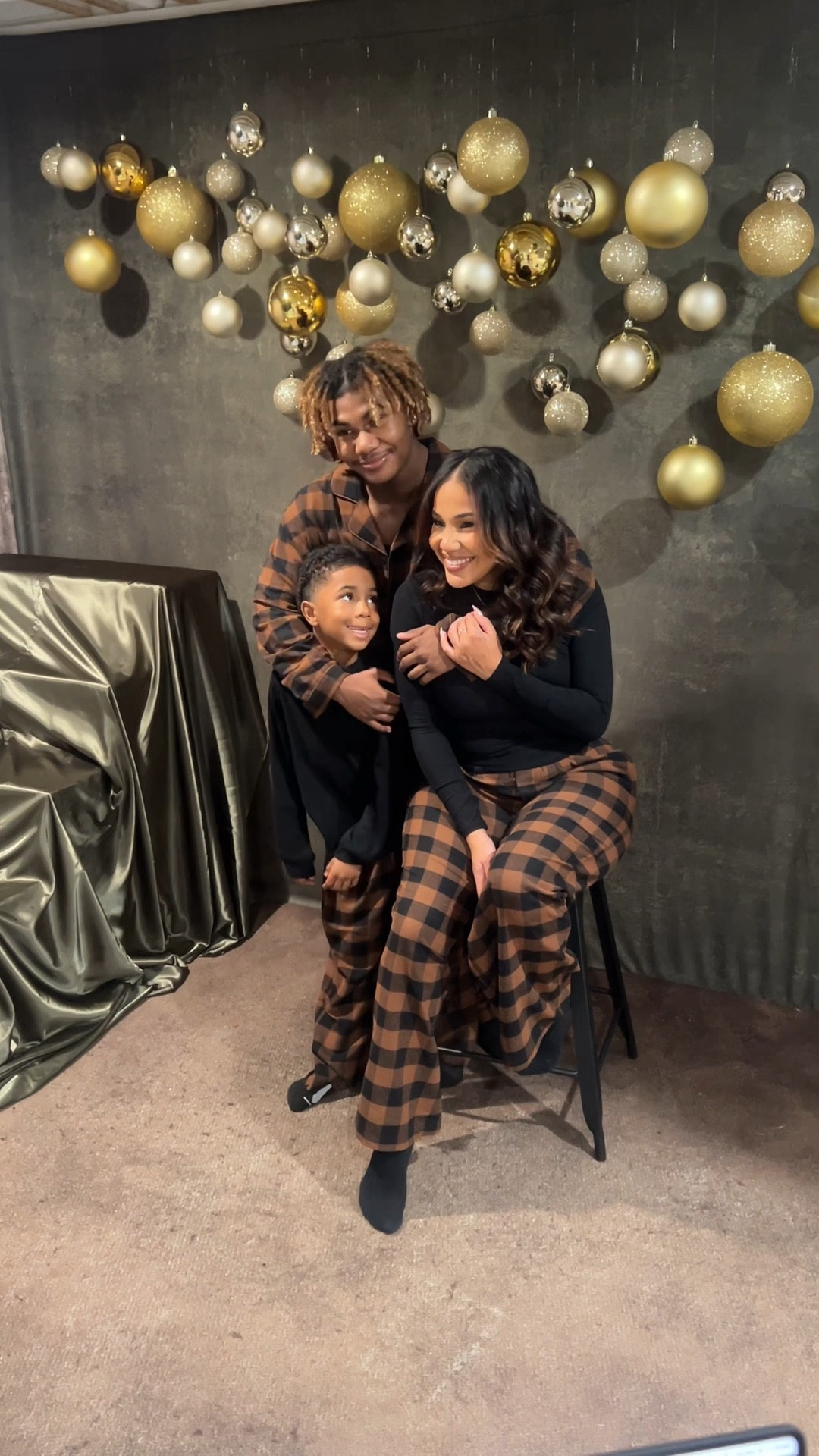 I had to play seamstress and fix Ashton’s pjs for this but we all know I love a project so it was TOTALLY worth it. Isn’t he the cutest! CJ looks SO handsome ugh I can’t 🥹. I hope you love our family photo as much as I do🖤🤎🎁.

#LTKFamily #LTKGiftGuide #LTKHoliday