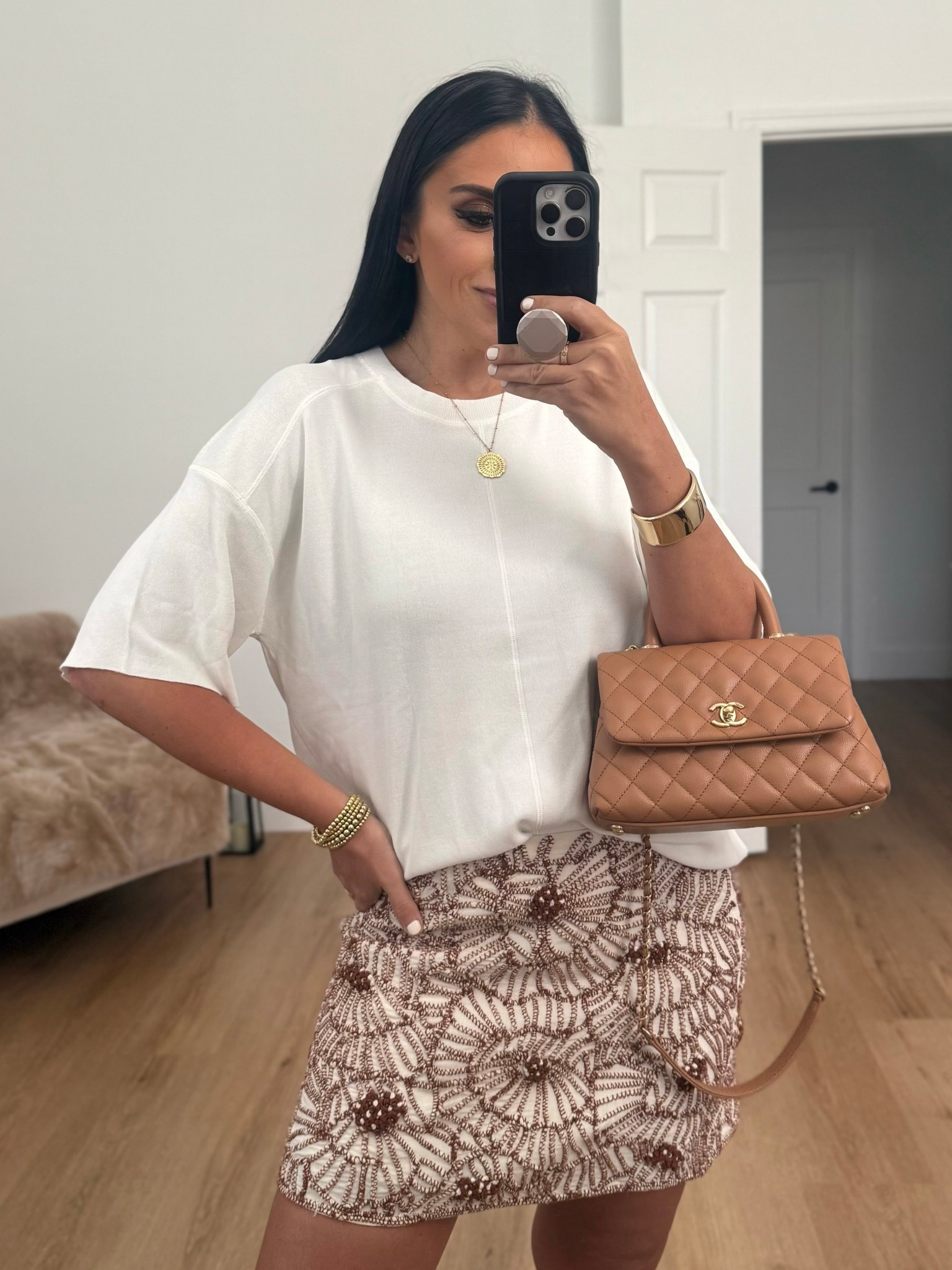 Oversized plain knit top wearing size small. ZW collection floral embroidered mini skirt wearing size medium. 