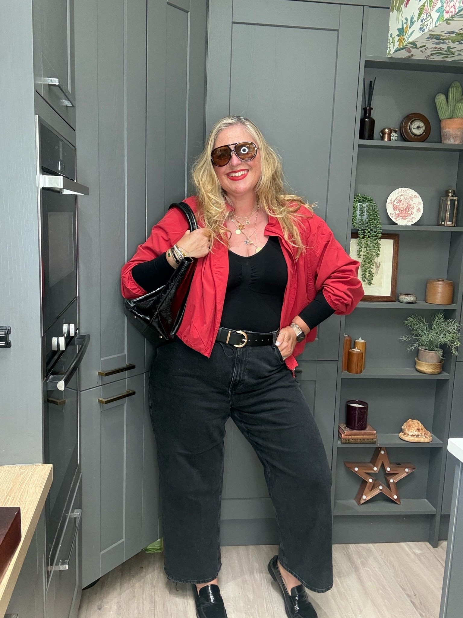 Black jeans, red bomber jacket, black loafers, black tote bag, black belt, red sunglasses

#LTKjeans #LTKplussize #LTKspring