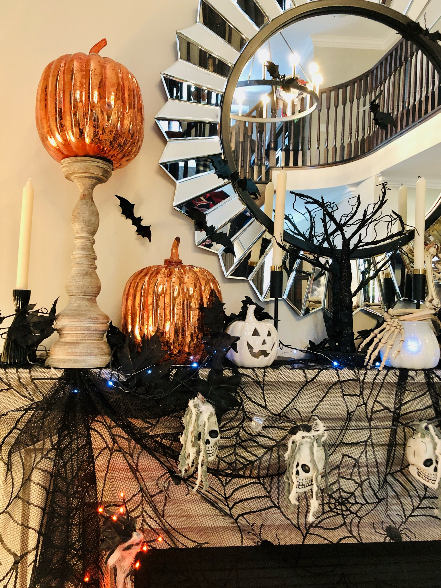 Styling a fireplace mantle with Halloween decorations 

#LTKFallSale #LTKHome #LTKSeasonal