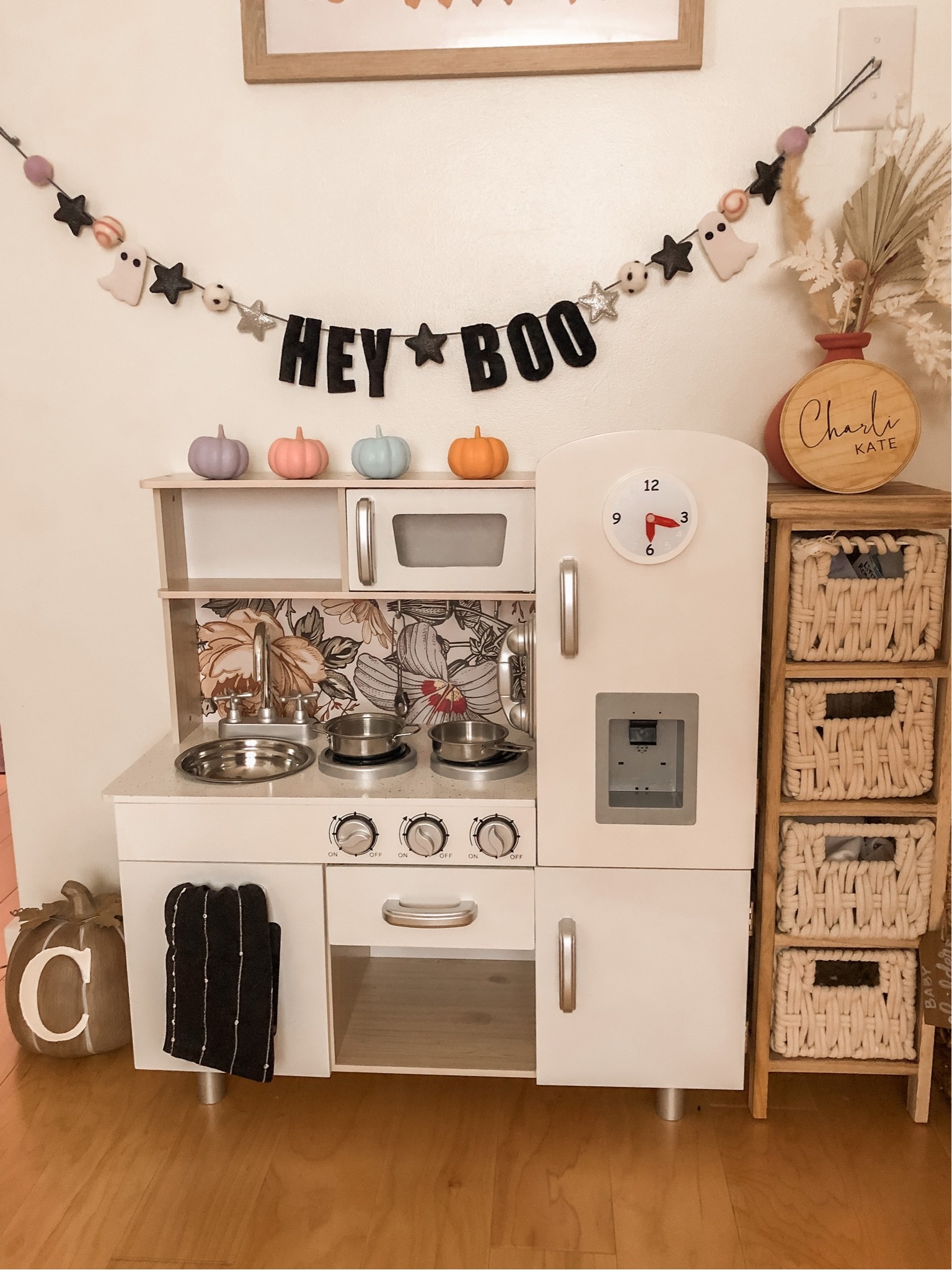 Halloween and fall decor for kids room, kids playroom! Kitchen set with floral wallpaper as backsplash. Pastel pumpkins 🤍 hey boo banner!

#LTKhome #LTKkids #LTKSeasonal