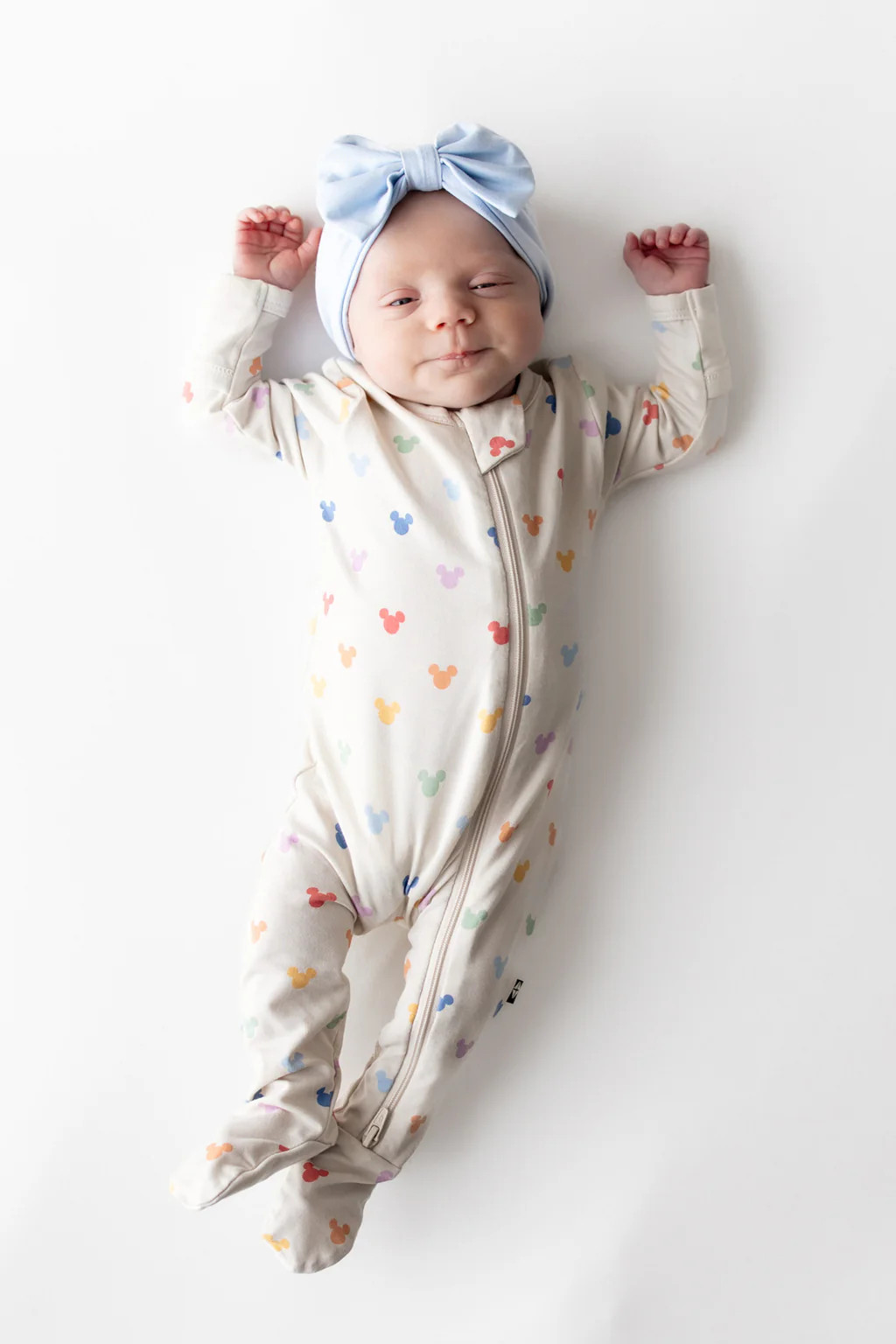 Zippered Footie in Pastel Mickey Mouse | Kyte Baby
