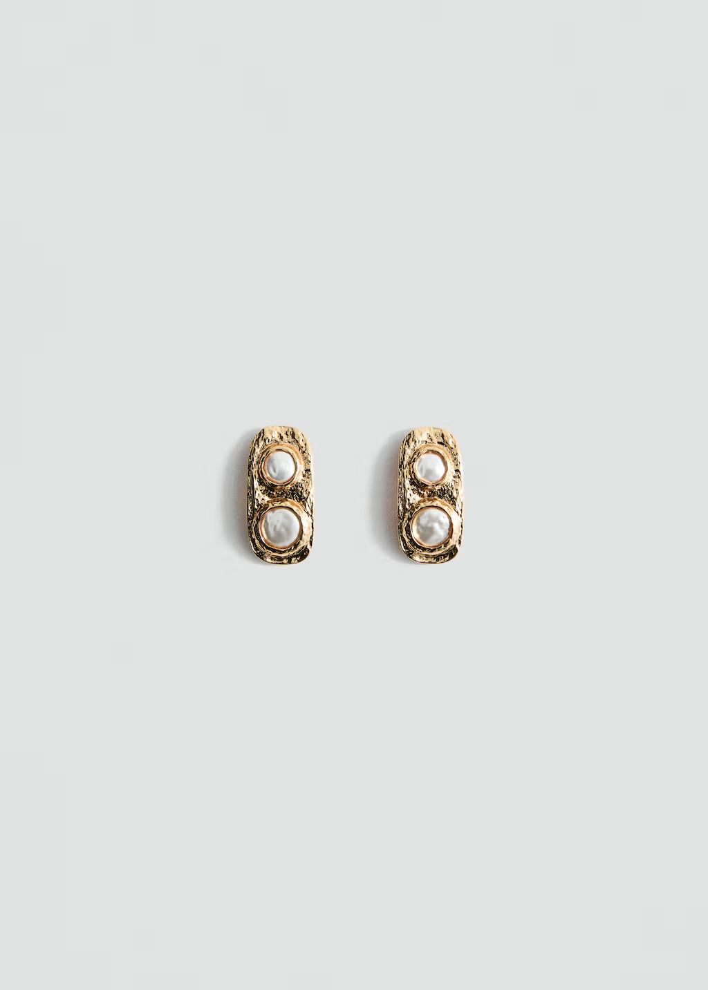 Boucles d'oreilles texturées et combinées | Mango EU