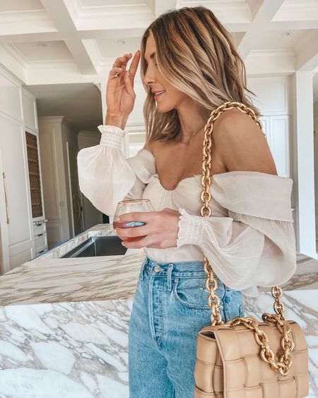 Valentine’s Day date night outfit inspiration. Romantic blouse, jeans, handbag. Blush top. Cella Jane. Dressy outfit. Date night  

#LTKstyletip