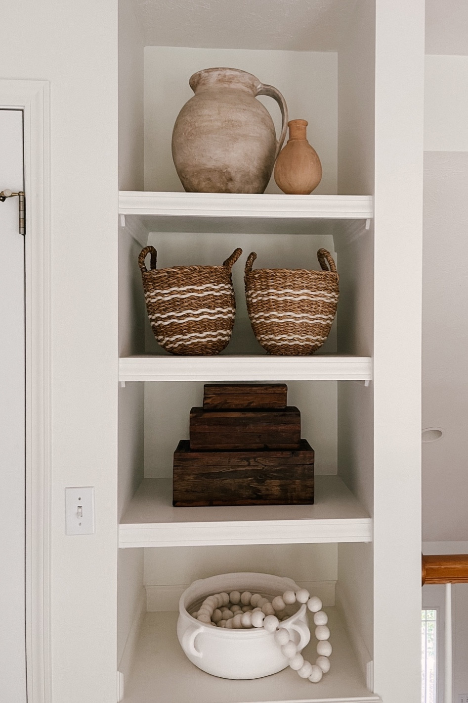 Shelving decor with mixtures of different textures and objects. My new favorite find of 2 end table stools!

#LTKHome #LTKFamily #LTKFindsUnder100