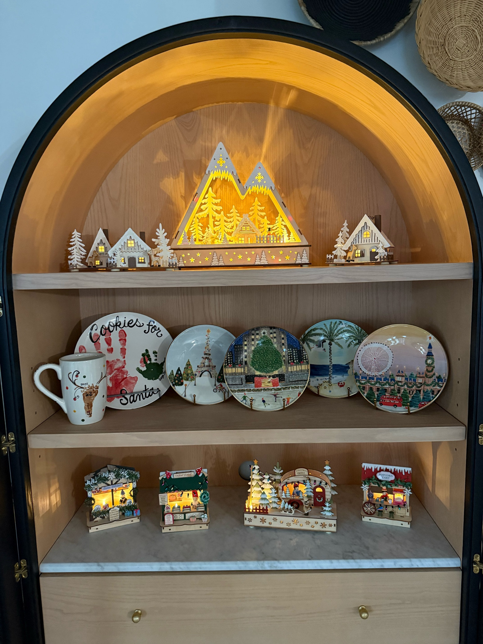 Our hutch decked out for the holidays! I am OBSESSED with these holiday/ Christmas anthro plates + these stunning Christmas village pieces made out of laser cut wood from World Market! So nostalgic.

Christmas decor | nostalgic holiday decor | Christmas plates | Christmas village | anthro hutch | classic Christmas decor 



#LTKHoliday #LTKSeasonal #LTKGiftGuide
