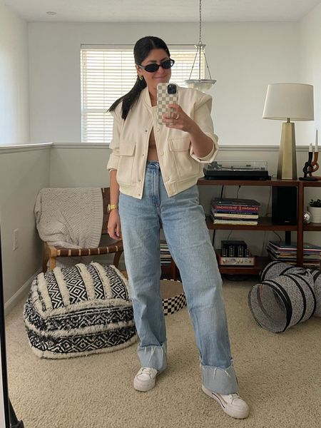 Nude bodysuit (similar linked) | cream bomber jacket (large) | cuffed jeans (8) | black sunnies | white sneakers | gold jewelry 

Spring outfit, neutral outfit, casual outfit 

#LTKfindsunder100 #LTKstyletip #LTKmidsize