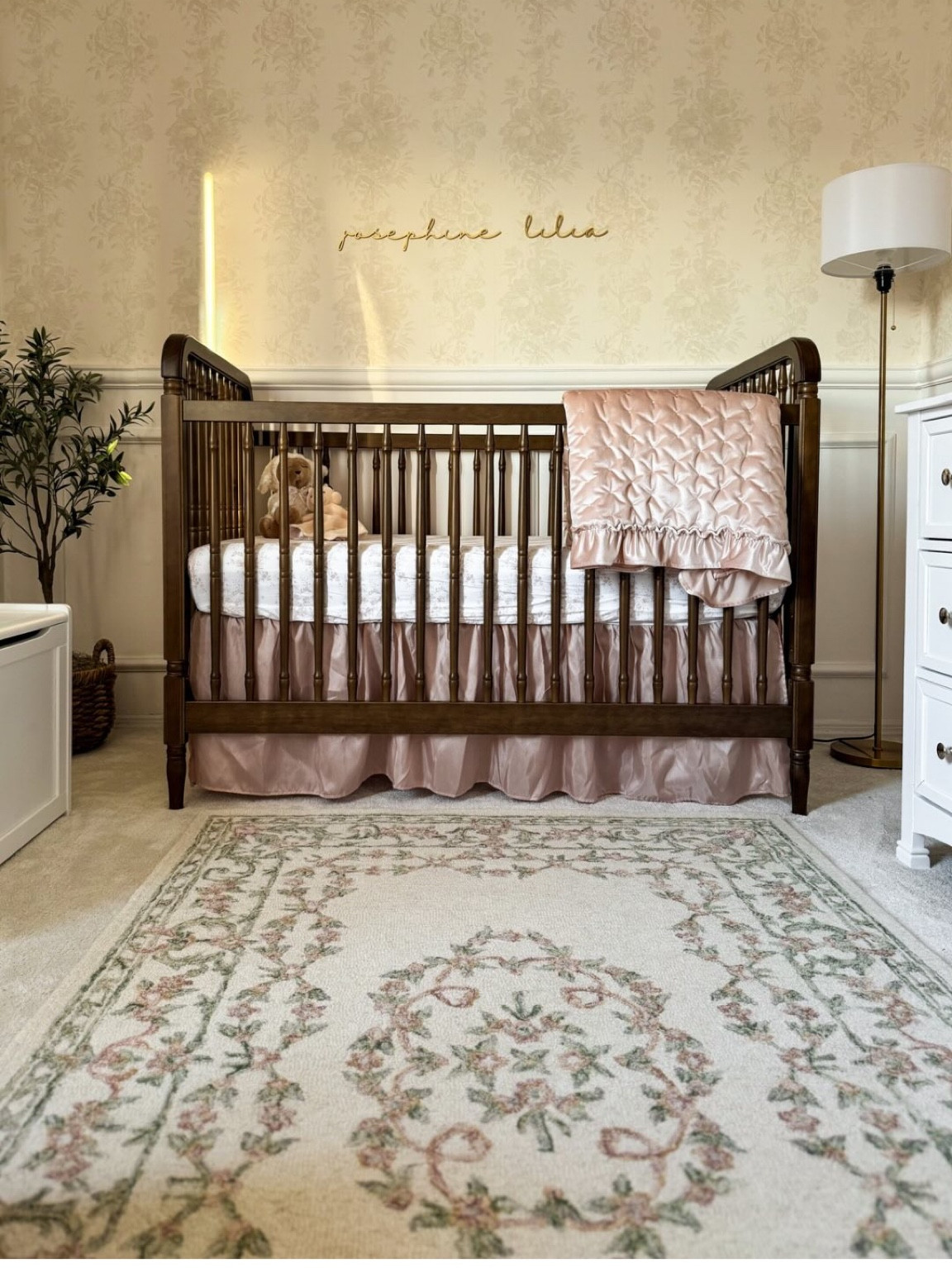 Introducing our sweet 𝑱𝒐𝒔𝒆𝒑𝒉𝒊𝒏𝒆 𝑳𝒊𝒍𝒊𝒂’𝒔 nursery 🥹🩷

This has been, hands down, the single greatest design project I’ve ever planned. For so long, I have prayed that this room would become a nursery, and in so many ways, it is a dream come true. 

I worked with so many incredible companies to make this vision come to life, and I want to take a moment to share each one (with dedicated posts to follow!):

@frameiteasy: I wanted our favorite keepsake on display, and without pause, I knew which frames I wanted to do these photographs justice. These are the Granby in Antique White, and they are the perfect complement to the space. 

Also, a huge thank you to @annaleephotographyny for capturing this beautiful moment in time!

@livetteswallpaper: When I first began to imagine the nursery, I knew I wanted a vintage wallpaper that would be timeless for years to come. This is their peel-and-stick Elegant Toile Pattern Removable Wallpaper in Mist and Off-White, and it truly is just as classic as I’d imagined. 

@framemymirror: This is the Amelia Gold arched mirror, and I fell in love with the size and shape as soon as I saw it! If it’s one thing I pray for our daughter, it is that she can look upon her reflection and know how loved she will always be. 

@levtexbaby: I couldn’t wait for this bedding to arrive! This is their Heritage Blush Velvet 4PC Crib Bedding Set, and it is just as lush and elegant as I’d hoped! Of course, the comforter will not be used for some time, but she will sleep in true luxury when she does! 

@twopagescurtains: From their Liz Linen Drape collection, these perfect pink blackout curtains, “Pink Lemonade,” compliment the subtle pink tones throughout the room and soften the space. They will be ideal for baby girl’s sleep, blocking out the sunshine during the day and keeping the room nice and cozy warm at night!

From the bottom of my heart, thank you all for helping to make our sweet baby girl’s room the coziest, most beautiful sanctuary I could have imagined. She is already so loved 🩷

#Nursery #BabyGirlNursery #NurseryReveal #BabyNursery #NurseryDecor #NurseryDesign #FYP #Reels #Discover #Explore #HomeDecor