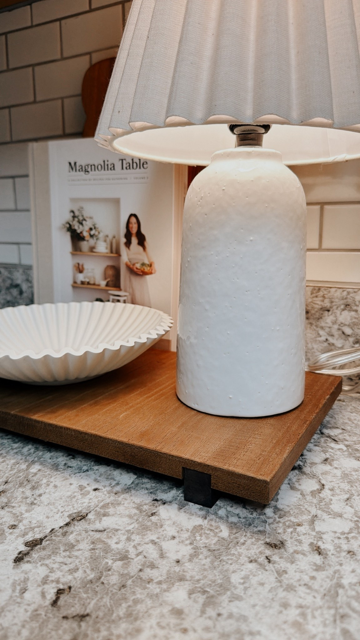 $11 wood riser for the win!

#LTKU #LTKmomlife #LTKHome