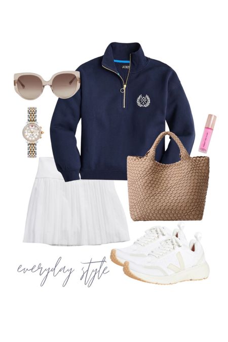 Everyday casual style! 

White tennis skort. Preppy navy pullover. Veja sneakers. Pink lipstick. Boden sunglasses. Amazon bag. Preppy casual style #LTKunder100 

#LTKshoecrush #LTKstyletip