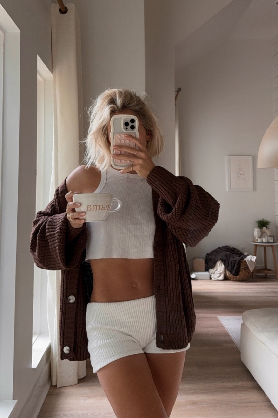 wearing an XL in the cardigan. shorts are Are You Am I & a bit steep, so I linked some as similar as I could find! Will also include the link for the exact ones I’m wearing!  
https://www.areyouami.com/products/minka-short 
wearing a medium 

#LTKstyletip #LTKfindsunder50 #LTKSeasonal