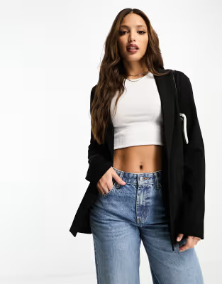 ASOS DESIGN Tall jersey slouchy suit blazer in black | ASOS (Global)