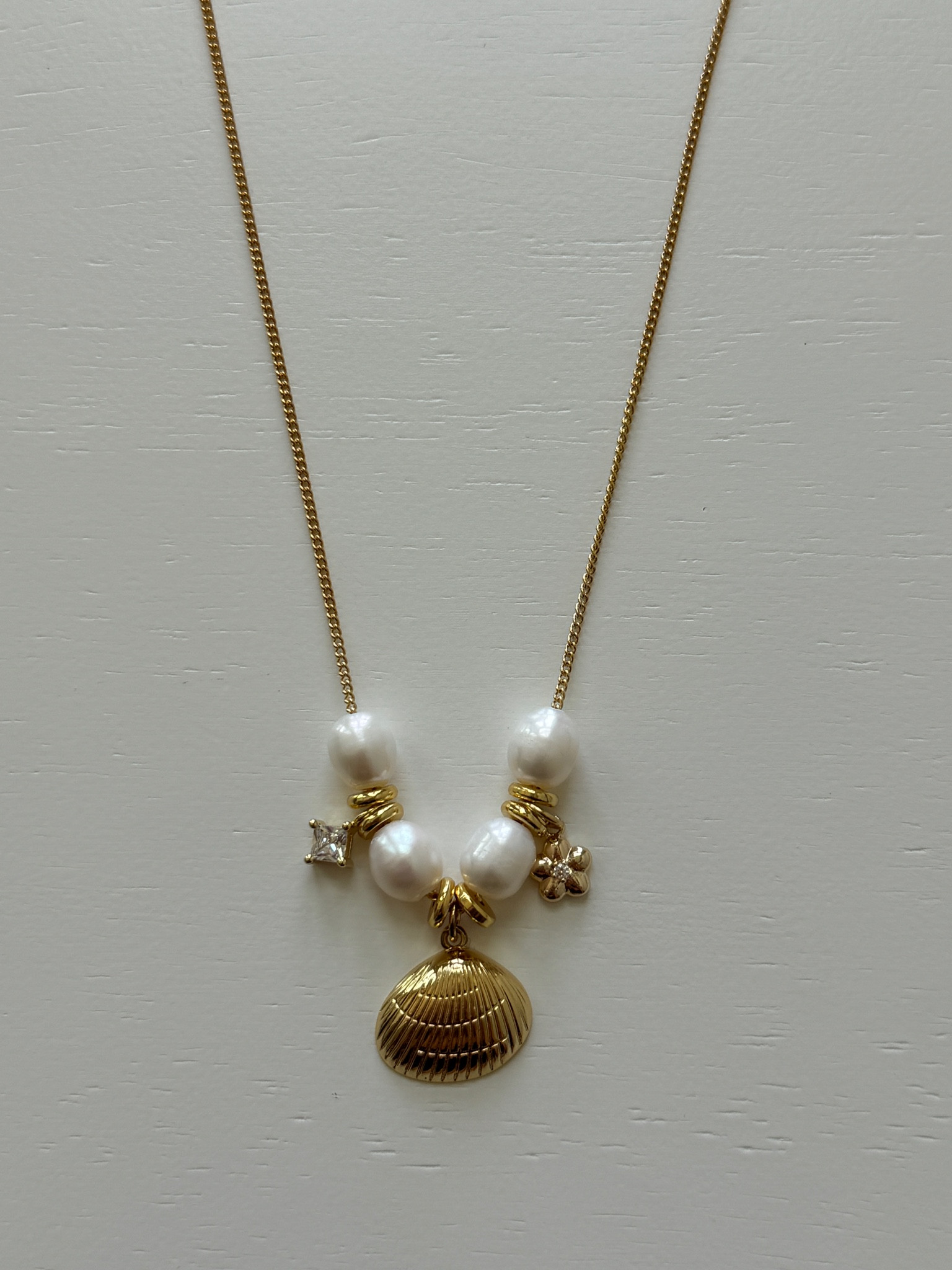 Handmade charm necklace, freshwater pearls, 14 & 18k plated gold 

#LTKFindsUnder100 #LTKStyleTip