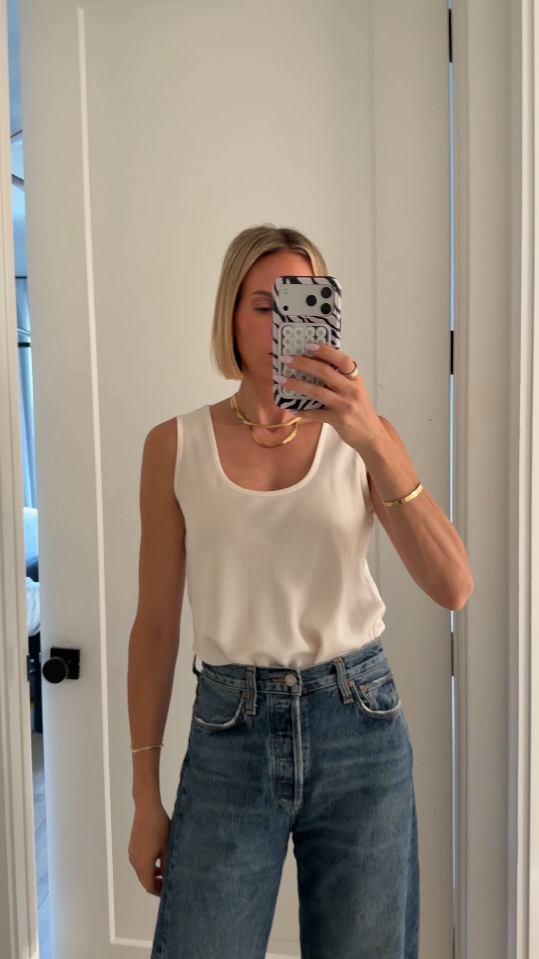 Where in a small in the tank. Size down one size in the jeans. ￼

#LTKWorkwear #LTKootd #LTKgrwm