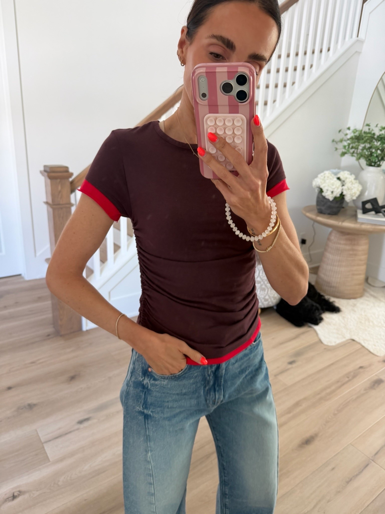 The color combo is what got me, but the ruching makes this tee so flattering. The chocolate brown with that pop of red feels like an easy way to start bringing fall color into my closet while it’s still hot out.

XS top, 25 jeans

ruched tee, fitted t shirt, chocolate brown top, red trim top, fall color palette, summer to fall outfit, casual denim outfit, everyday top, transitional fashion, fall outfit idea, annabrstyle

#LTKootd #LTKSeasonal #LTKOver40