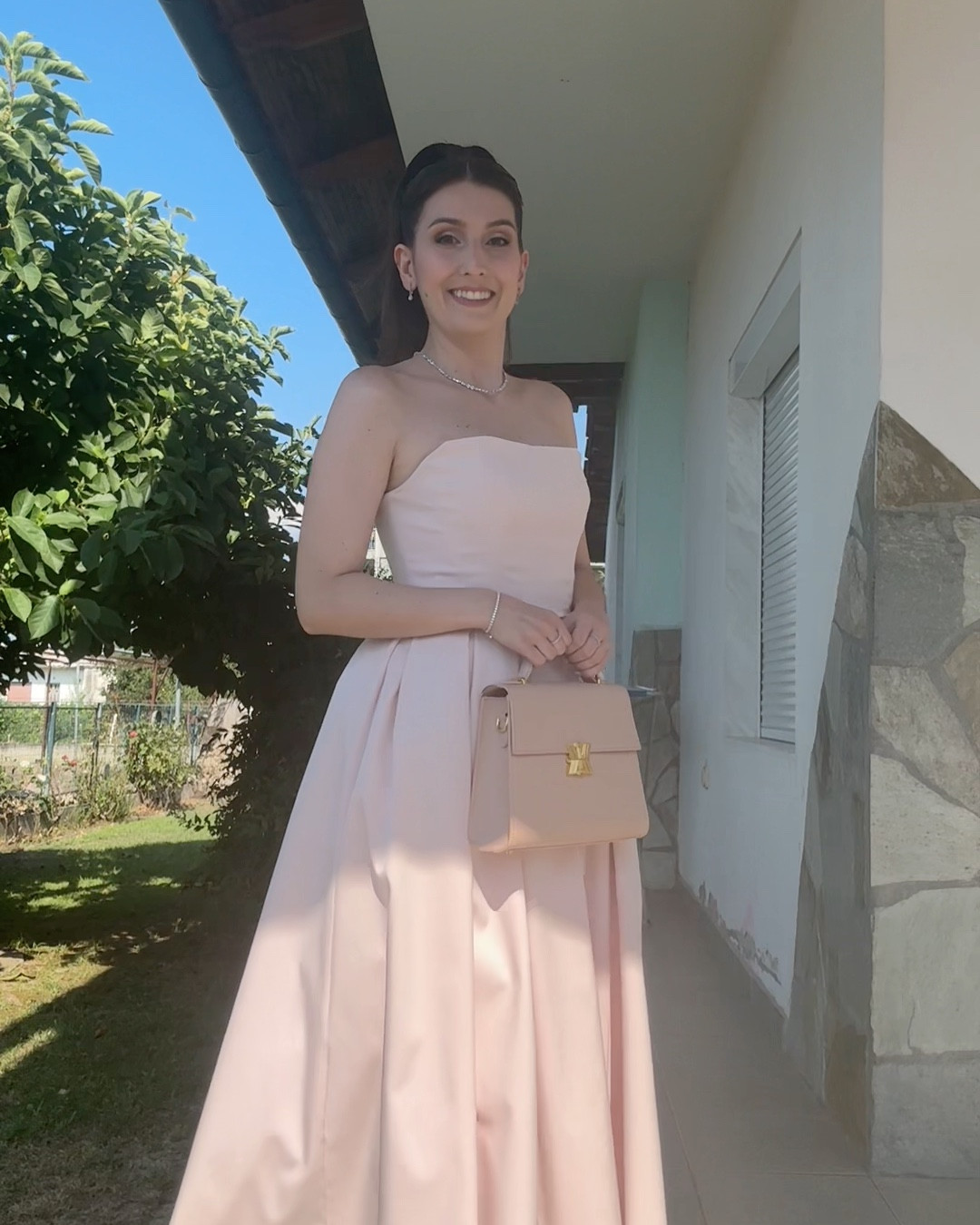 The outfit I wore at the wedding deserved a separate post! 
I love planning outfits especially when it comes to big events! So for the wedding of my childhood friend I already started planning since last year!

You might think I’m joking but I’m not 🙈 I took screenshots of the hair, dress, jewellery and shoes back in December!

Every time I plan an outfit I start by choosing the main star of the look. For this outfit initially it was the shoes! Bella Belle asked people to vote back in October their favourite design and the one I liked won! So I had the idea to build a pink outfit around that! A couple of months pasted by and I saw the House of CB dress on Instagram! I instantly fell in love and I knew it had to be the main character of the look! It’s simple yet stunning and it would compliment the shoes very well! 

One day in December while scrolling on Vinted I saw the necklace and it was an instant YES! I already bought the pink earrings and the pink ring so it would match perfectly! While looking for ponytails/updo hairstyles I stumbled upon a picture of Hailey Bieber from the Met Gala. This barbie inspired ponytail was the perfect one for this look! By February I had everything ready 😏 


Even though the shoes are not released yet the rest of the outfit came out as I had it in mind! In the end I wore heeled sandals and with the heat of Greece it was probably a great idea! Unfortunately I had to change to flat shoes mid ceremony because the insole of the heels was completely ruined. So ruined that I started feeling the wood part of the shoe! Ouch! The irony was that I took it to a shoe maker to fix it (the end of it came unglued) and got it back on the morning of the wedding 😒


What do you think about it? Do you like it? Would you change anything?