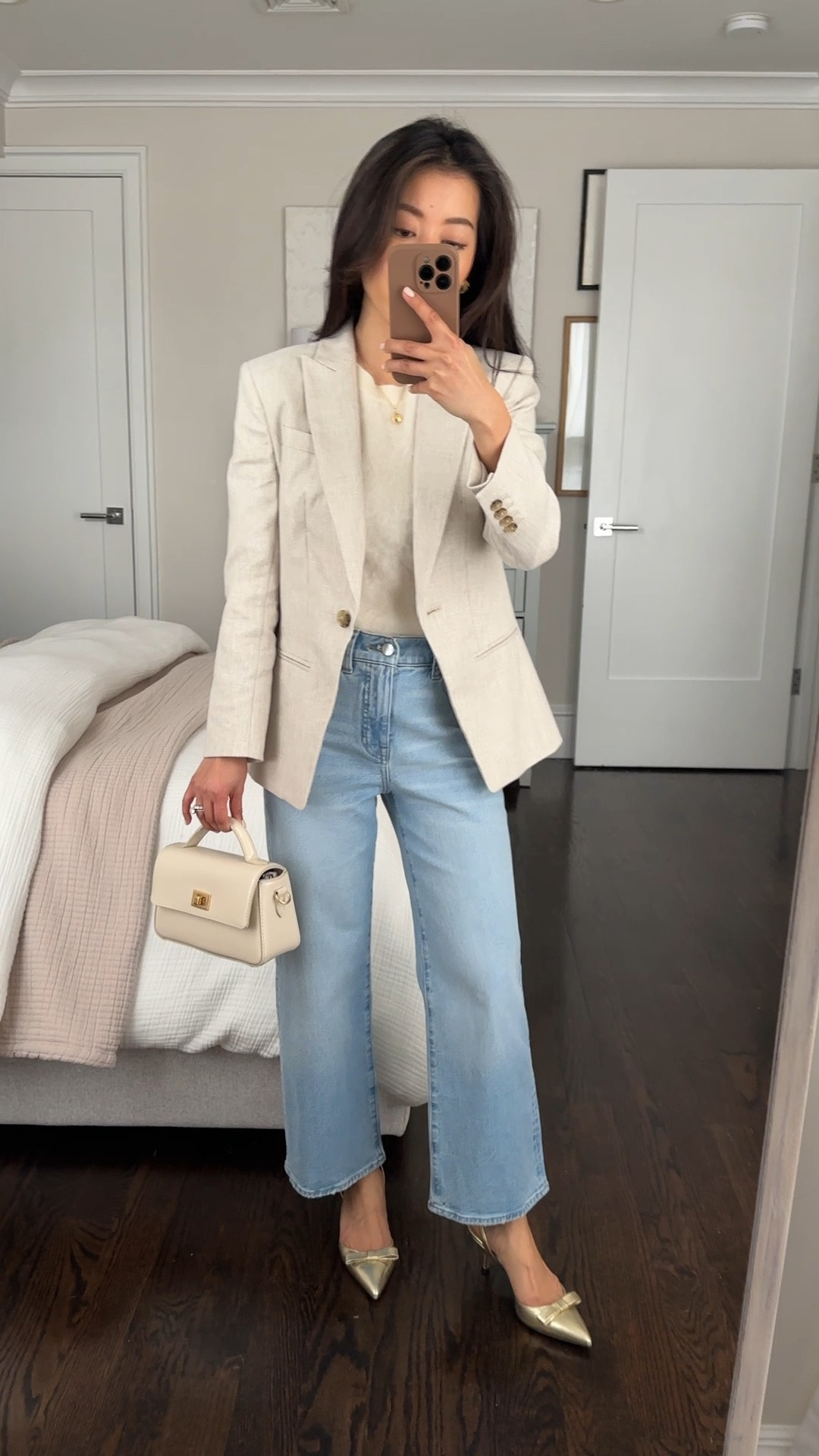 30% off w code SPRING
One of my favorite J. Crew denim styles fully stocked in this wash! Also linked a one piece swimsuit I love that’s on sale (I do sz 0)

•jcrew slim wide jean size 24 petite. Love this style jeans I also own the dark blue and black! Sizing runs a little big at the waist. 

If you are in between sizes,  i think you can size down

• Alexandra linen blazer sz 0 petite - great quality, very nicely tailored, fitted and shapely. Neutral pairs well with lots of items including workwear and denim. 

I sized up, and a 0P is still slim fit on me. Jcrew petite jackets are cut a little shorter at the sleeve length fyi 

 • brushed cashmere tank xxs. A luxe staple and petite friendly!

• Colette bow heels 5H

• Small Edie top-handle bag in Italian leather in pale bone with removable crossbody strap

•Criss Cross stud earrings. Lightweight with a classic vintage look 

@jcrew #ad #injcrew

Work wear with jeans, spring office outfit, smart casual , classic style 

#LTKSpringSale #LTKWorkwear #LTKPetite