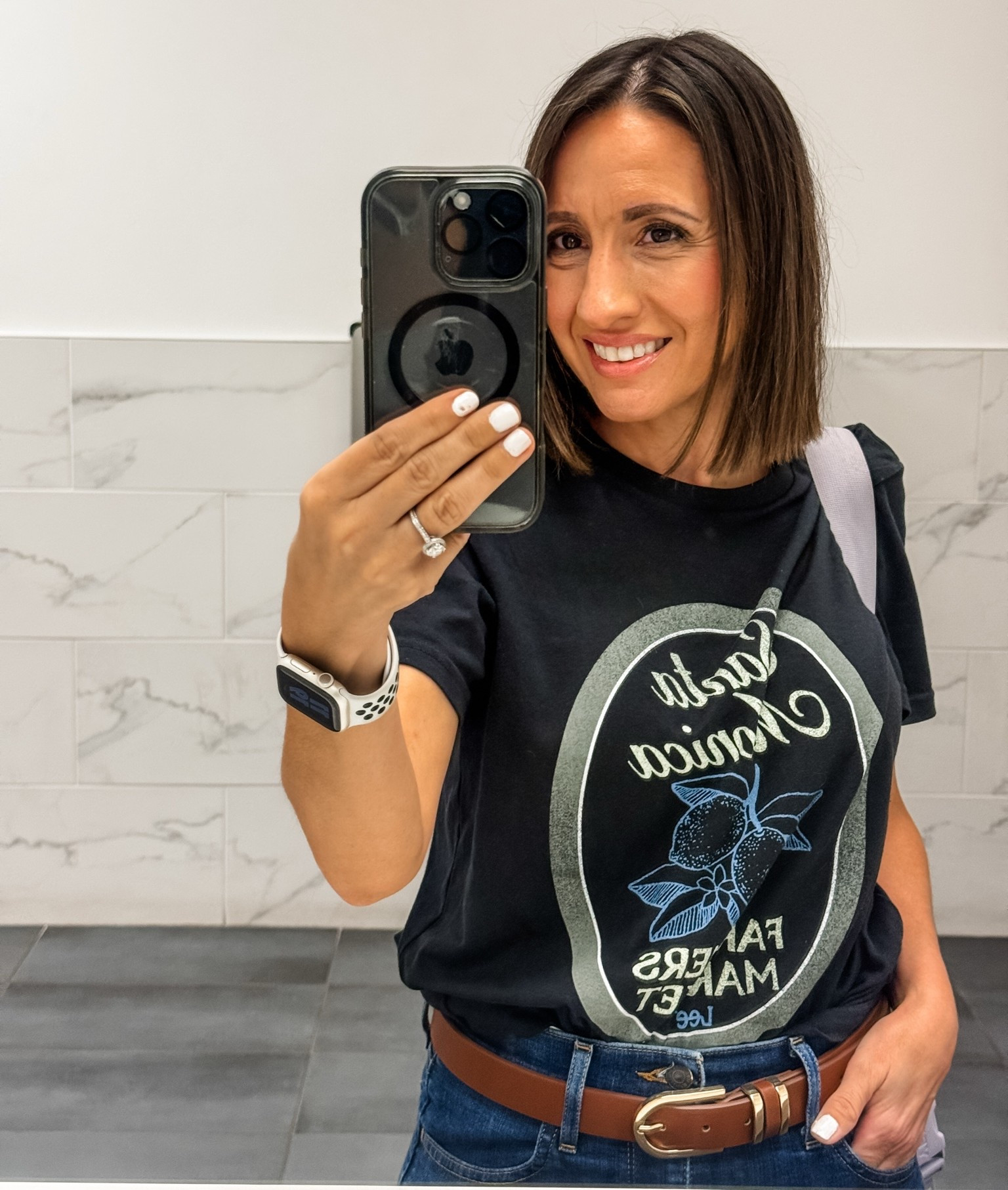 Hello! Gotta share a good sale. 
This black graphic t-shirt with Santa Monica written on the front is on sale. Sizing runs true to size. 
Levi’s jeans are great quality and run true to size. 
Petite style 
Petite outfit

#LTKPetite #LTKOver40 #LTKootd