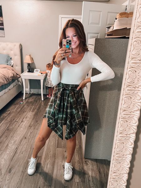 Okkk, I’m definitely feeling the vibe of this outfit! I was so hesitant on the skirt but finally just caved and bought it. So glad I did because I’m obsessed! 

So flattering and cute to style. Love that it can be a comfy relaxed fit or you can dress it up to your liking. 

Outfit including shoes is under $50! 



#LTKunder100 #LTKstyletip #LTKHoliday
