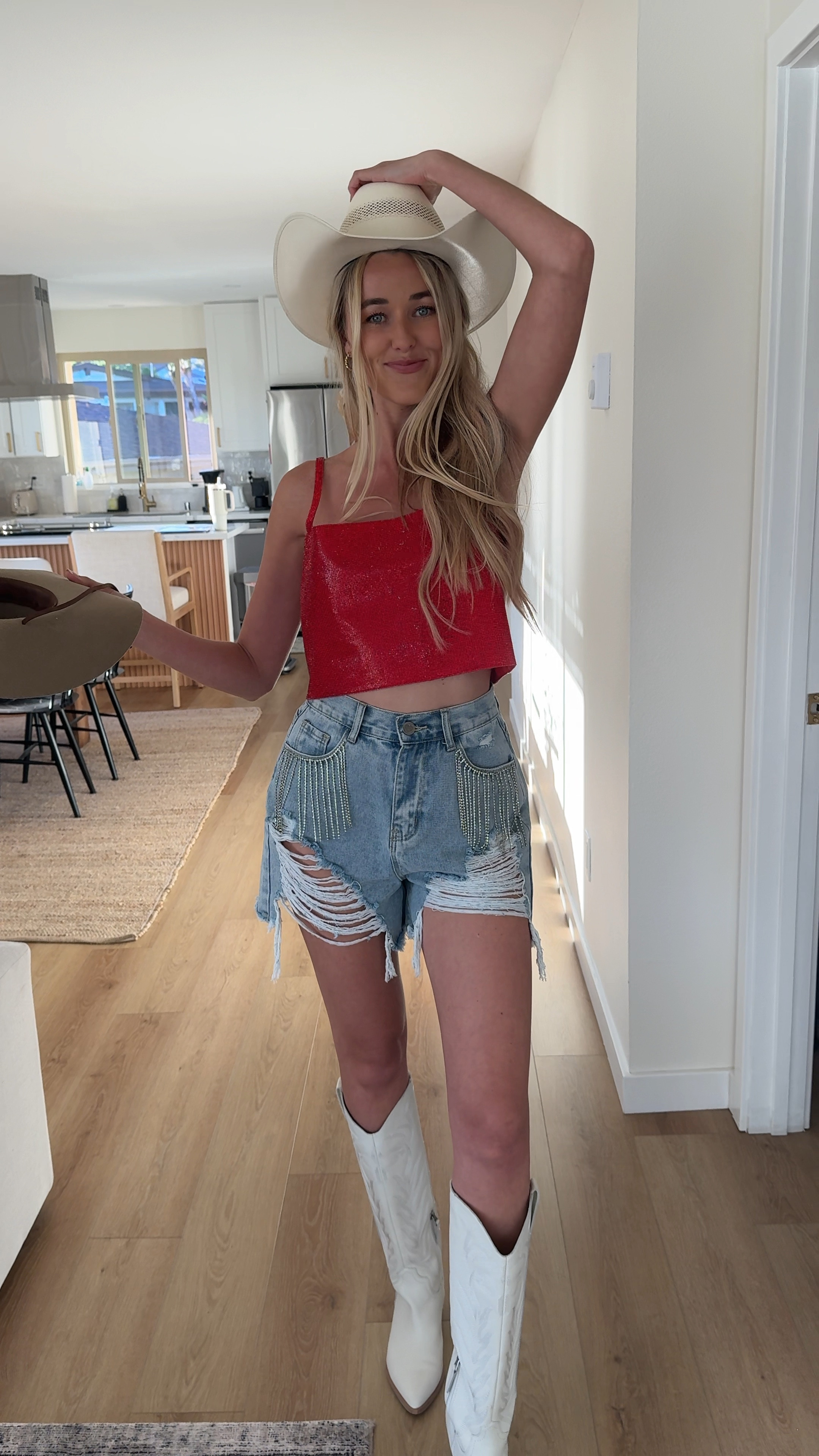 Classic red sparkly crop and ripped rhinestone shorts. 10/10 perfect festival fit ✨

#LTKstyletip #LTKFestival #LTKVideo
