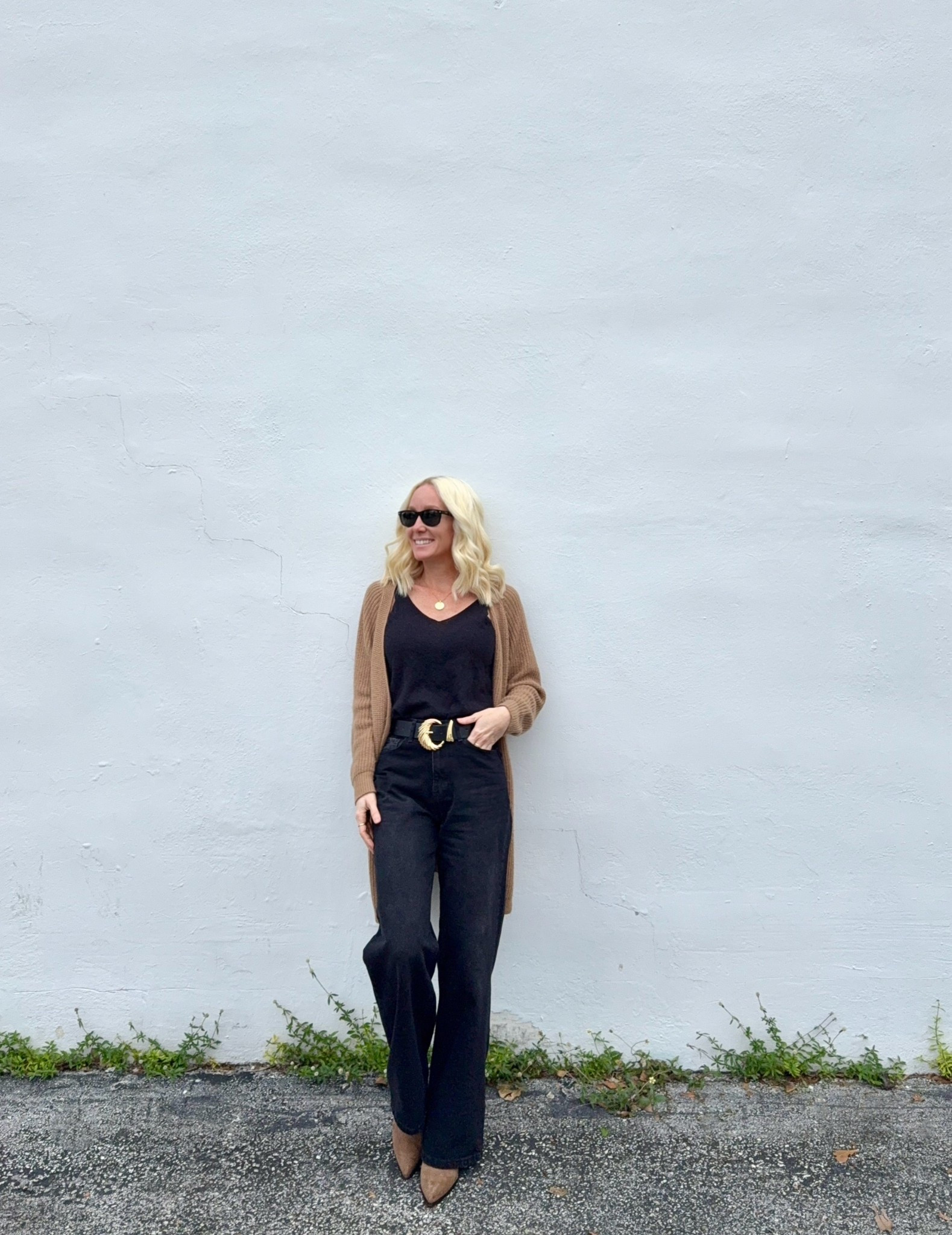 Black on black with a detailed belt and pop of color from the sweater and boots  

Women’s casual winter looks, casual Friday looks, monochromatic looks, 

#LTKSeasonal #LTKWorkwear #LTKSaleAlert