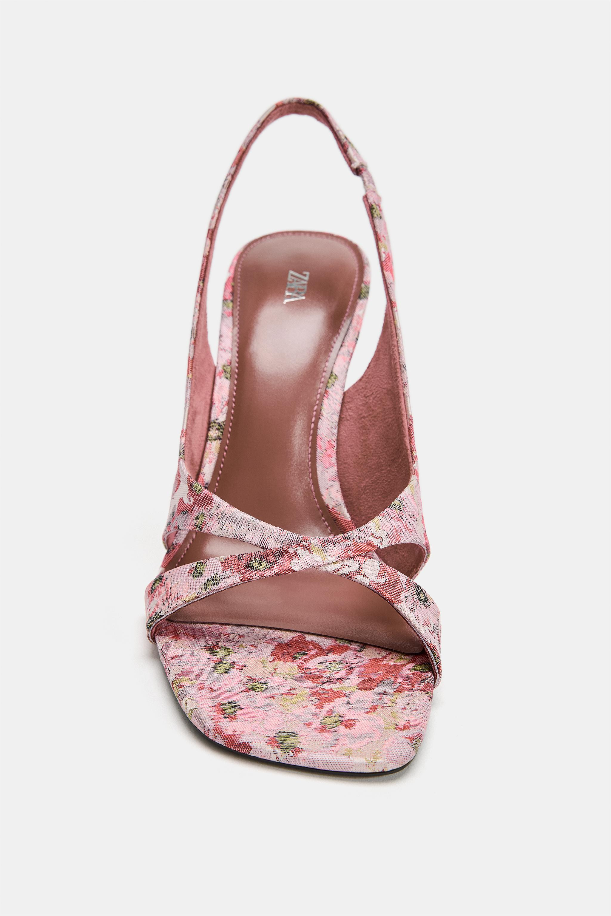 Heeled sandals. Featuring a floral print upper. Crisscross strap detail at the front. Slim high h... | Zara US