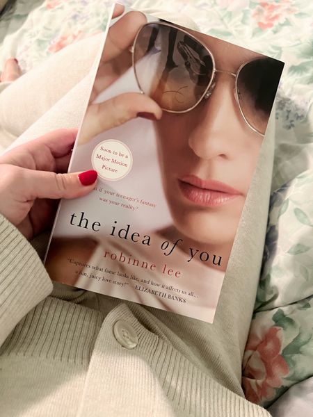 Book recommendation. “The Idea of You” by Robinne Lee. Amazon find. 

* synopsis *

“Solène Marchand, the thirty-nine-year-old owner of an art gallery in Los Angeles, is reluctant to take her daughter, Isabelle, to meet her favorite boy band. But since her divorce, she’s more eager than ever to be close to Isabelle. The last thing Solène expects is to make a connection with one of the members of the world-famous August Moon. But Hayes Campbell is clever, winning, confident, and posh, and the attraction is immediate. That he is all of twenty years old further complicates things.

What begins as a series of clandestine trysts quickly evolves into a passionate and genuine relationship. It is a journey that spans continents as Solène and Hayes navigate each other’s worlds: from stadium tours to international art fairs to secluded hideaways in Paris and Miami. For Solène, it is a reclaiming of self, as well as a rediscovery of happiness and love. When Solène and Hayes’ romance becomes a viral sensation, and both she and her daughter become the target of rabid fans and an insatiable media, Solène must face how her romantic life has impacted the lives of those she cares about most.”
.
.
…. 

#LTKfamily #LTKfindsunder50 #LTKfindsunder100