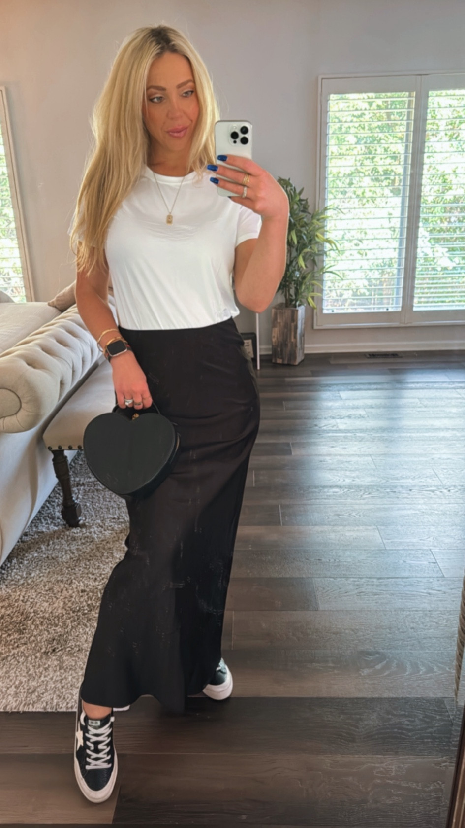 The softest basic tshirt I’ve ever worn and the skirt is also super soft, stretchy snd double lined to smooth everything out! Love this outfit!

#LTKSeasonal #LTKStyleTip #LTKFindsUnder50