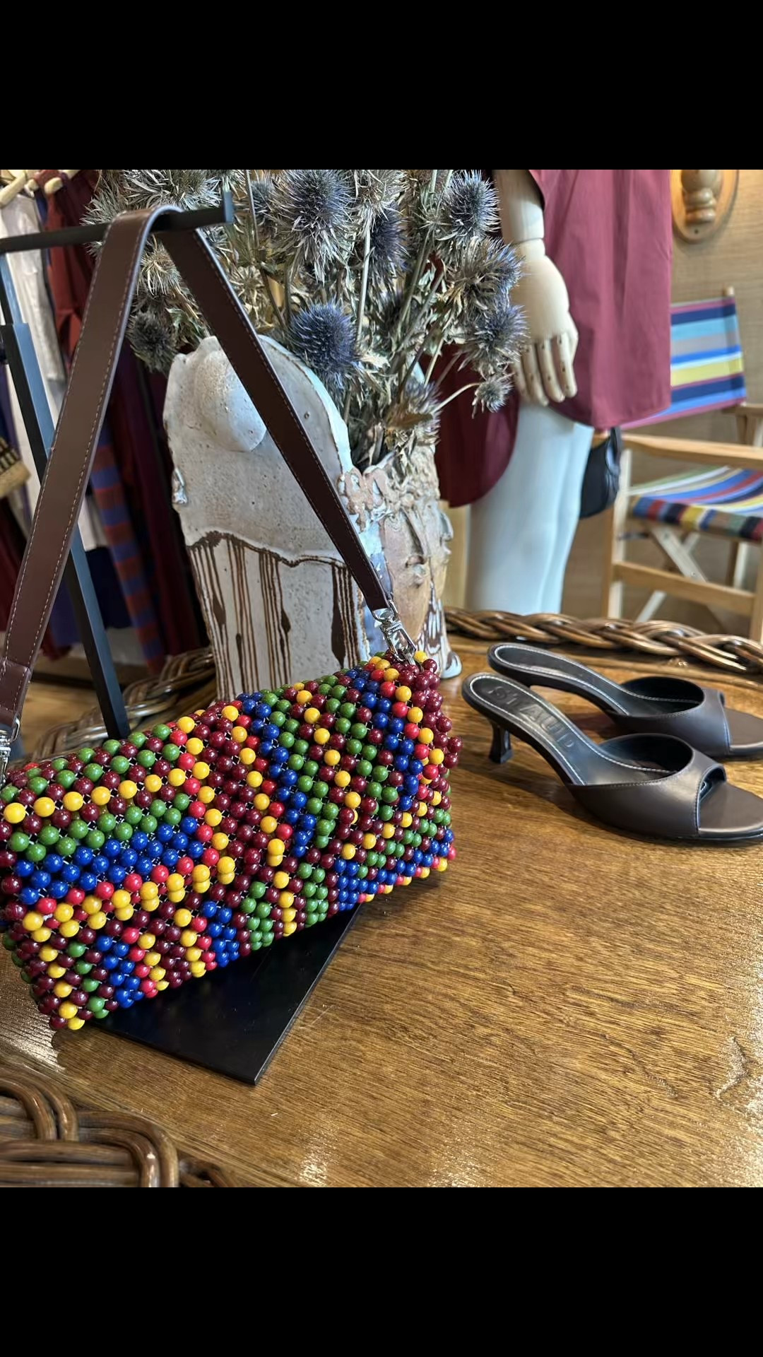 Love the multicolor beaded bag and the espresso heels. 

#LTKShoeCrush #LTKItBag
