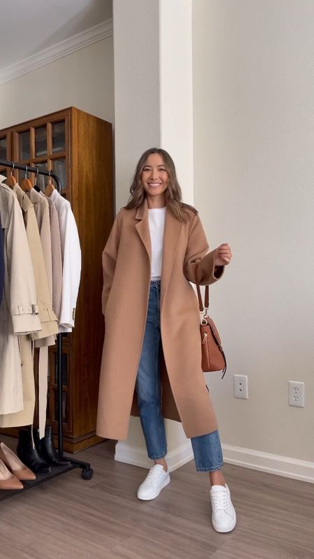 Casual winter outfit 

Camel coat xs
White tee
Everlane blue jeans - I sized down 
White sneakers 
Sophiya backpack in camel

#LTKworkwear #LTKunder100 #LTKtravel
