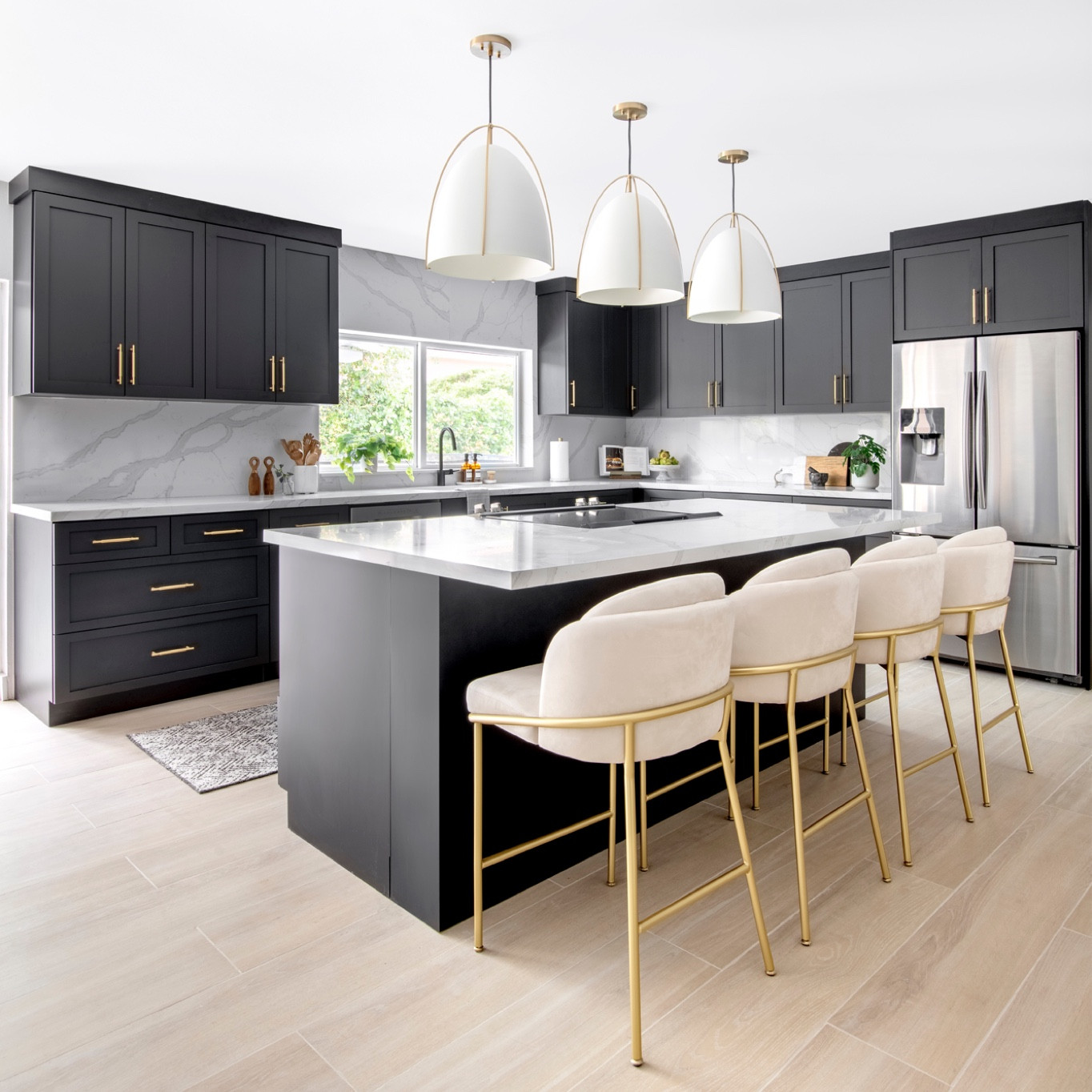 Modern Coastal Kitchen with Black Cabinets by Studio 790 Interior Design
The key design element in this modern coastal kitchen was the black cabinets! The light floors and the natural light, the black is offset well and 
works amazingly in this home! #miamidesigner #modernkitchens #blackcabinets #floridahomedesign #miamihomedesign #coastalkitchen #moderndesign #interiordesign #interiordesigner #miamihomedesign #boldkitchendesign #studio790 

#LTKhome