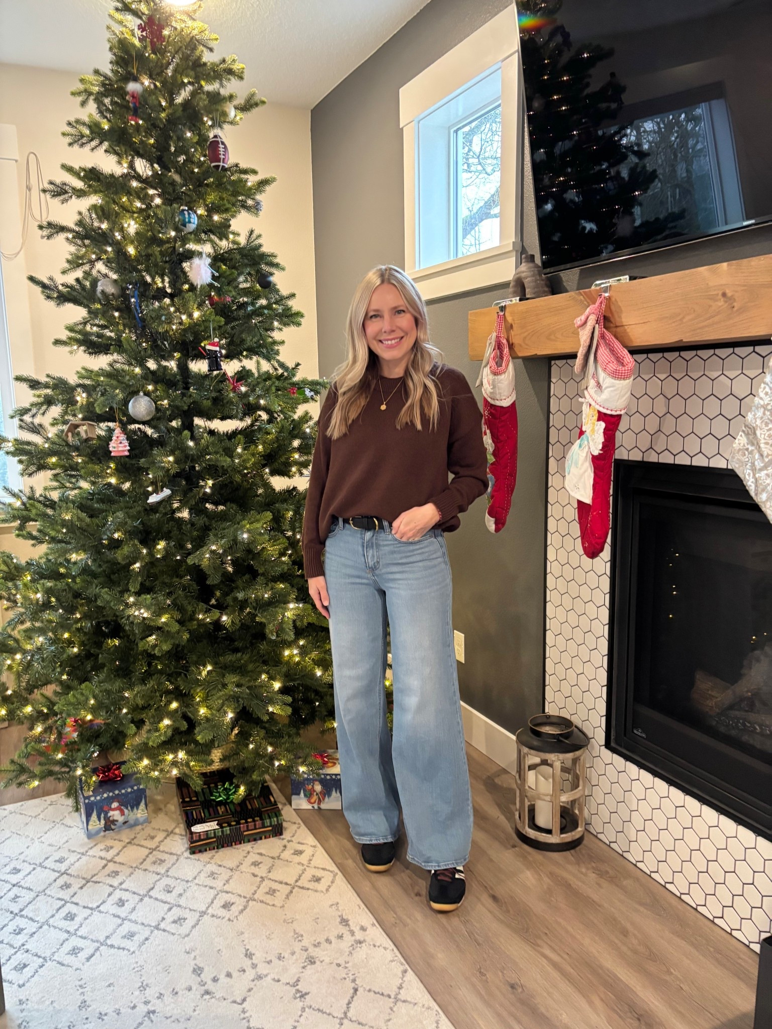 Sunday outfit vibes 🤎
Easy, comfy, and holiday-ready. These jeans are my go-to (only $28!) — I own them in two colors because they’re that good. The sweater is a new find and it’s currently on sale, which makes it even better.

Wore this look to our first family Christmas celebration of the season 🎄
And yes… our Christmas tree has already been losing ornaments regularly thanks to our cat  

Perfect mix of casual, festive, and comfortable for all the holiday moments 🤍

#LTKHoliday #LTKdayinmylife #LTKgrwm