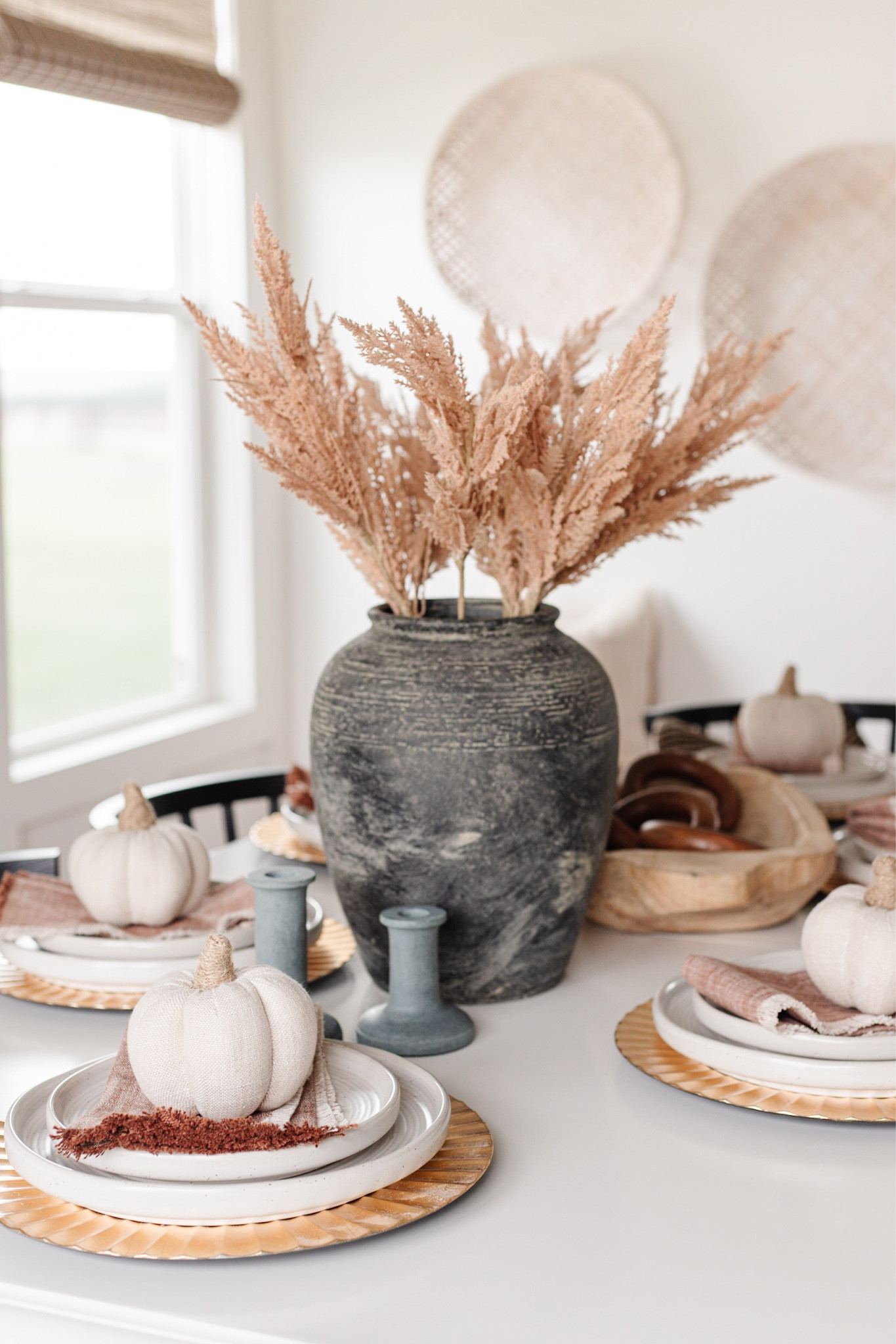 Fall table decor with pampas grass, fabric pumpkins, and gold fluted plate chargers 🍂 

#LTKSeasonal #LTKhome #LTKunder100