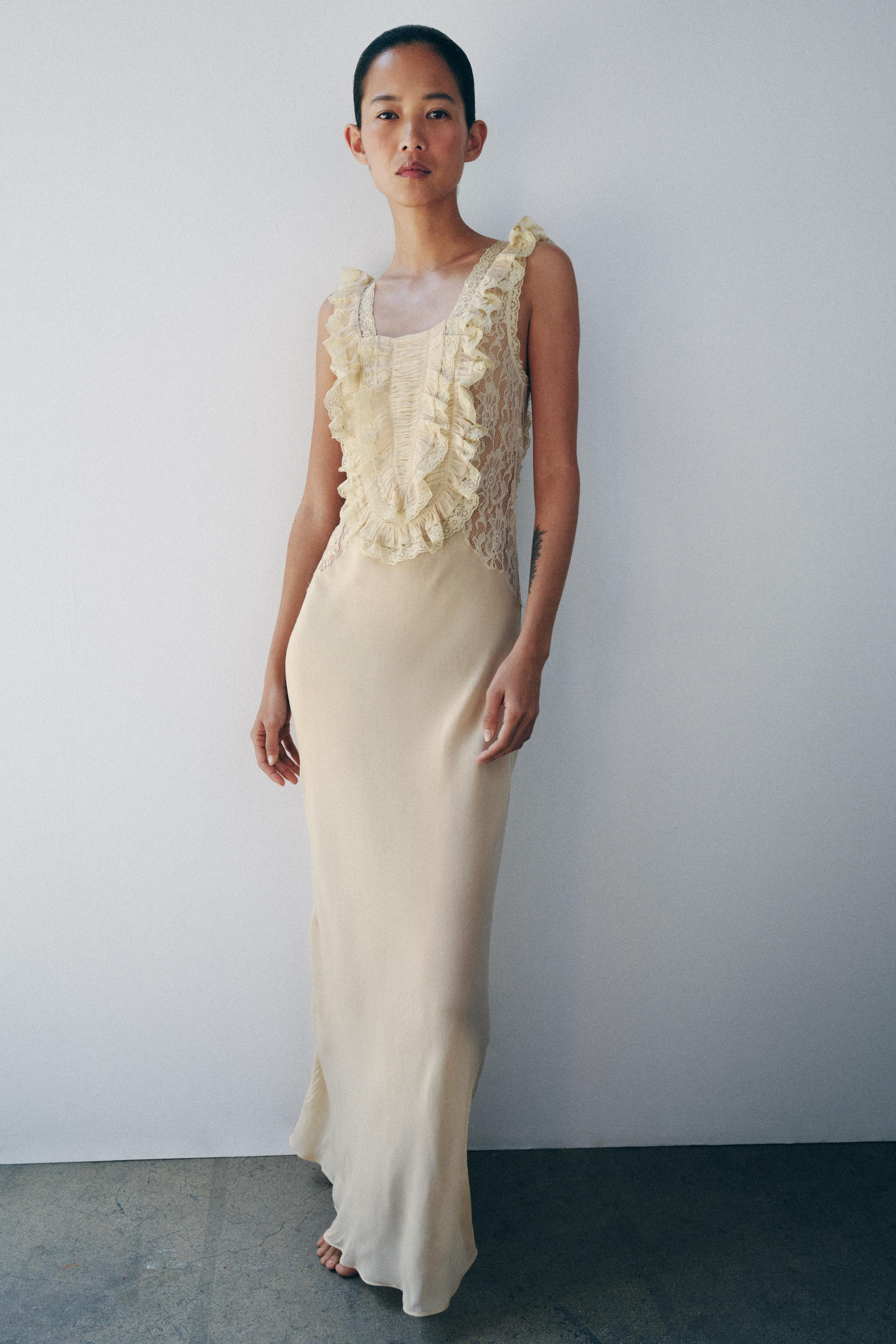 Maxi dress made from 100% viscose. Square neckline with wide straps. Featuring draped fabric deta... | Zara US