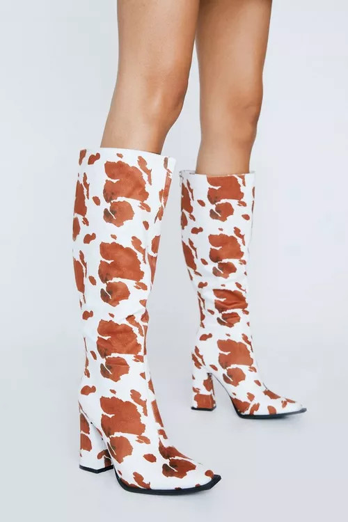 Cow Print Knee High Heeled Boots | Nasty Gal (US)