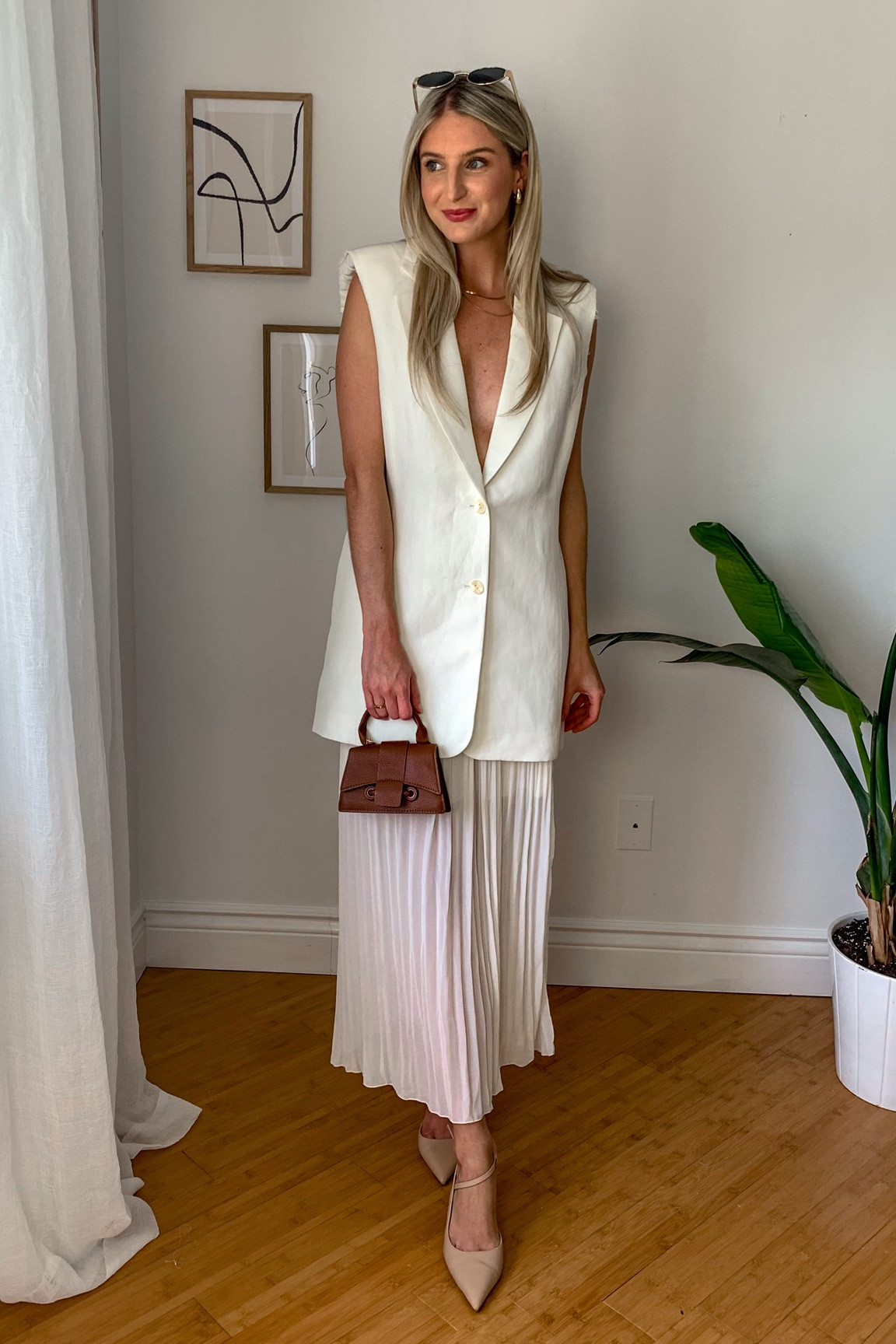 Love a good tailored vest for summer! This is more of a long tailored jacket.  Such a classy look! 

#LTKFindsUnder100 #LTKSeasonal #LTKStyleTip