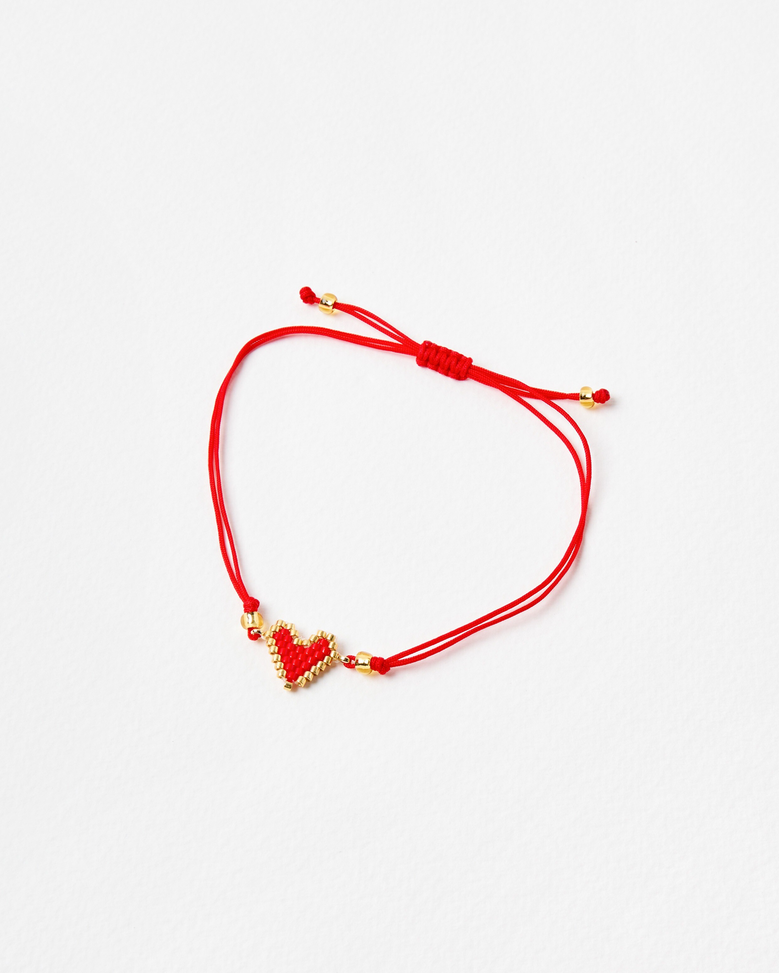 Magda Beaded Heart Cord Friendship Bracelet | Oliver Bonas | Oliver Bonas (Global)