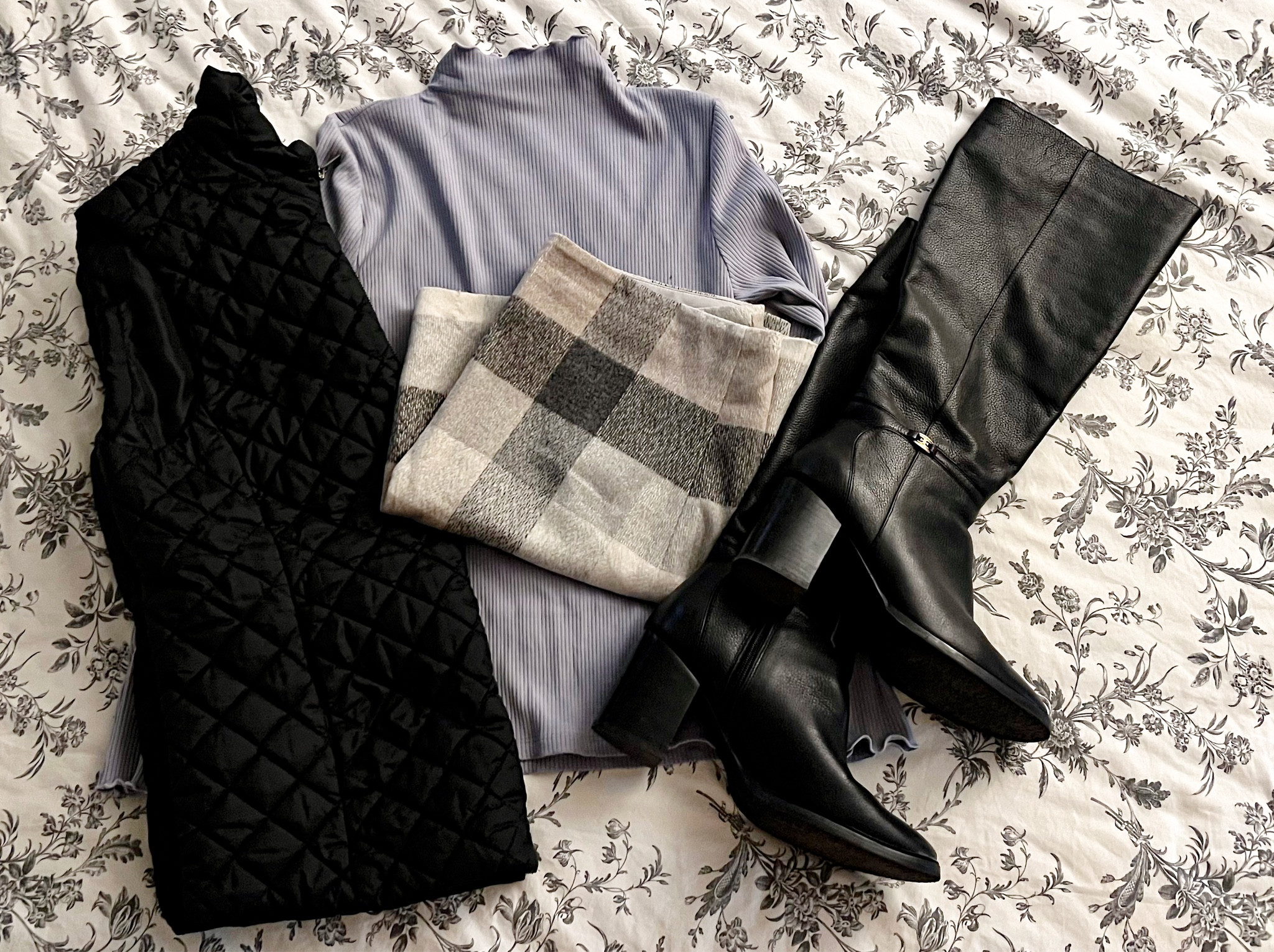 Holiday outfit without the holiday colors!! I am a sucker for good plaid skirts and this one does not disappoint. The colors are great for Thanksgiving, Christmas, and even for some family photos. This outfit is also great for the workplace.

#LTKworkwear #LTKmidsize #LTKHoliday