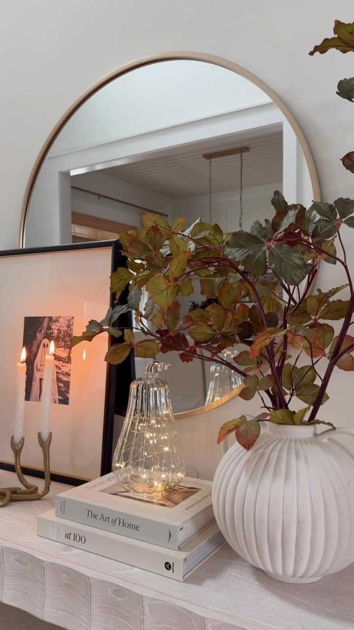 happy first day of fall! 🍁 | it’s officially pumpkin season & no space is safe from a little bit of cozy, switched up the mirror in my entryway and I’m obsessed with how it all turned out! (can you believe it’s @amazon + under $100!) I have the 36” size 🪞 @amazonhome 

save + share for fall inspo! 🫶🏼
#amazon #amazonhome #entryway #entrywaydecor #entrywaytable #falldecor #fallinspo #halloweendecor #halloweenhome #roundmirror #neutralhome 

#LTKSaleAlert #LTKHome #LTKSeasonal